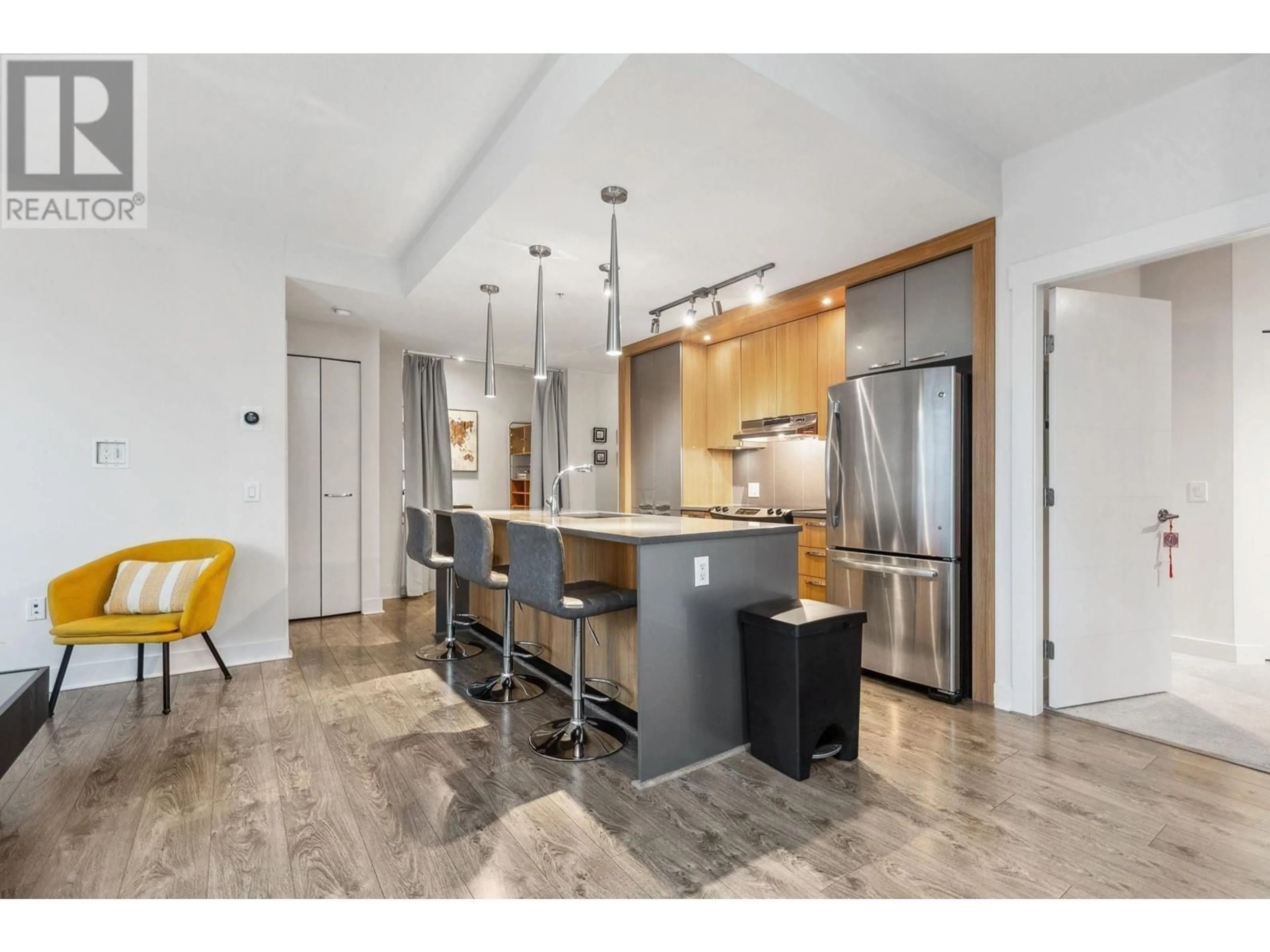 Open concept kitchen, ceramic/tile floor for 309 - 733 14TH STREET, North Vancouver British Columbia V7M0C6