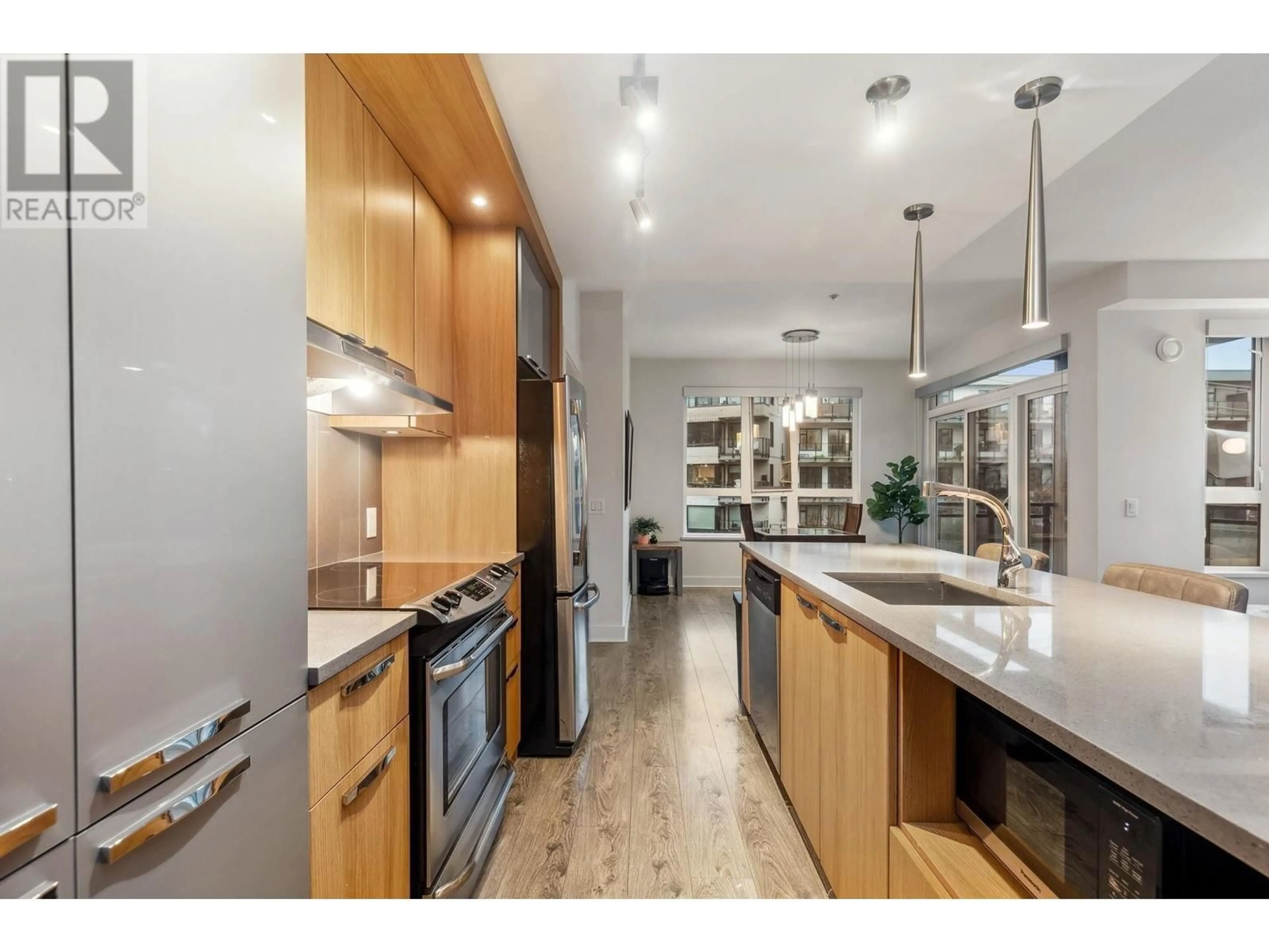 Open concept kitchen, unknown for 309 - 733 14TH STREET, North Vancouver British Columbia V7M0C6
