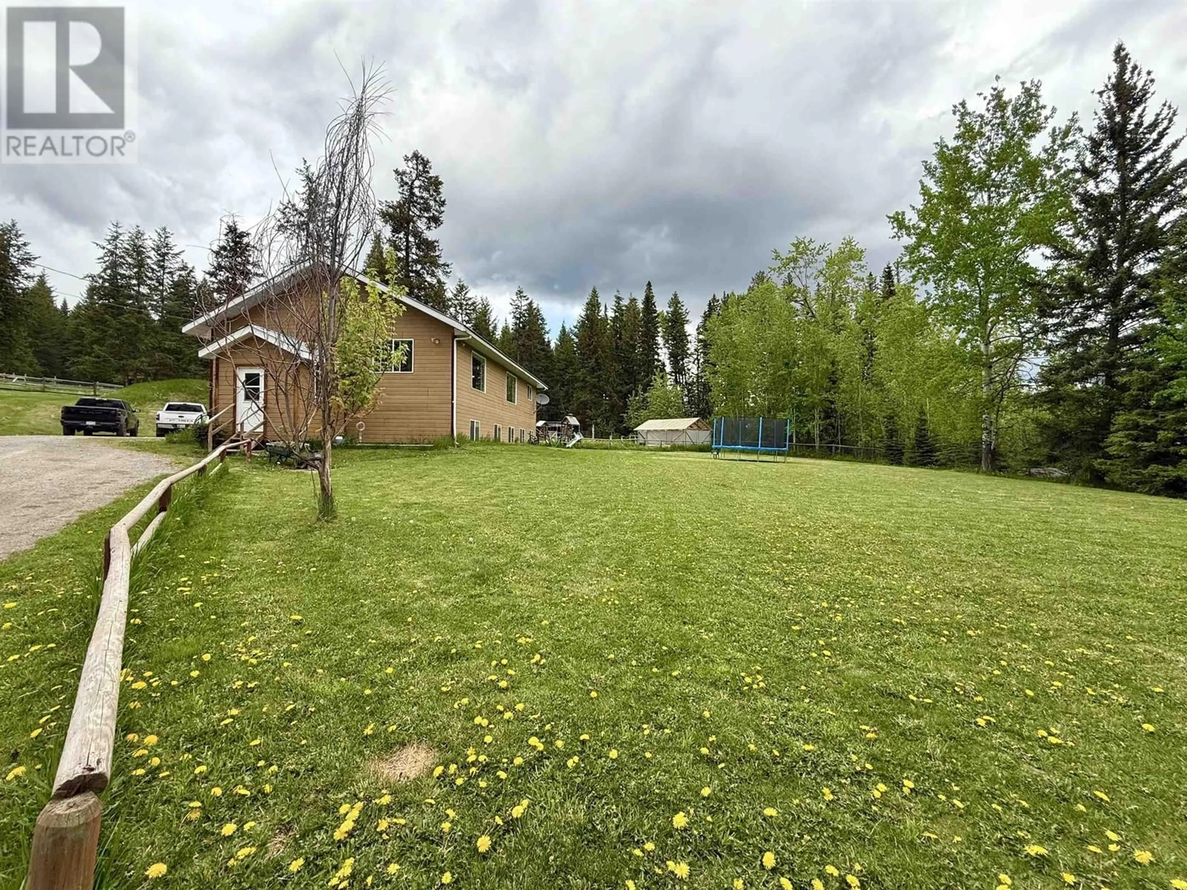A pic from outside/outdoor area/front of a property/back of a property/a pic from drone, forest/trees view for 1449 ENRIGHT ROAD, McLeese Lake British Columbia V0L1P0