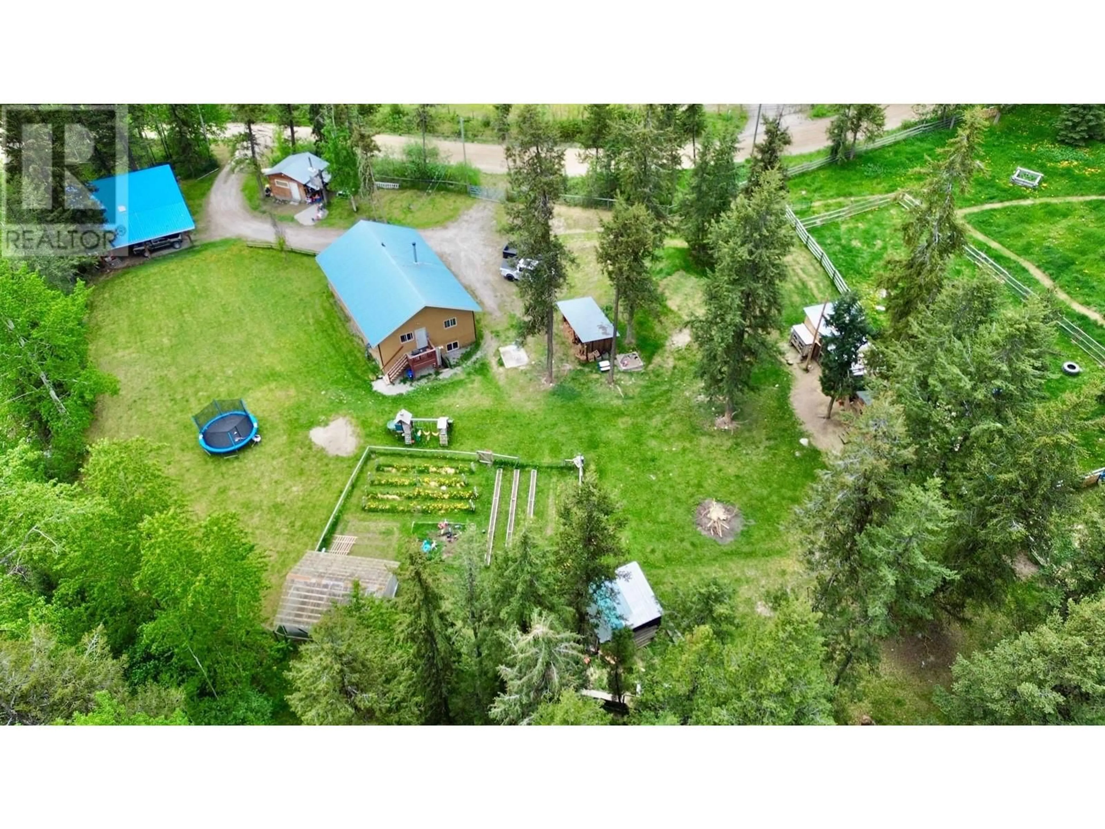 A pic from outside/outdoor area/front of a property/back of a property/a pic from drone, forest/trees view for 1449 ENRIGHT ROAD, McLeese Lake British Columbia V0L1P0