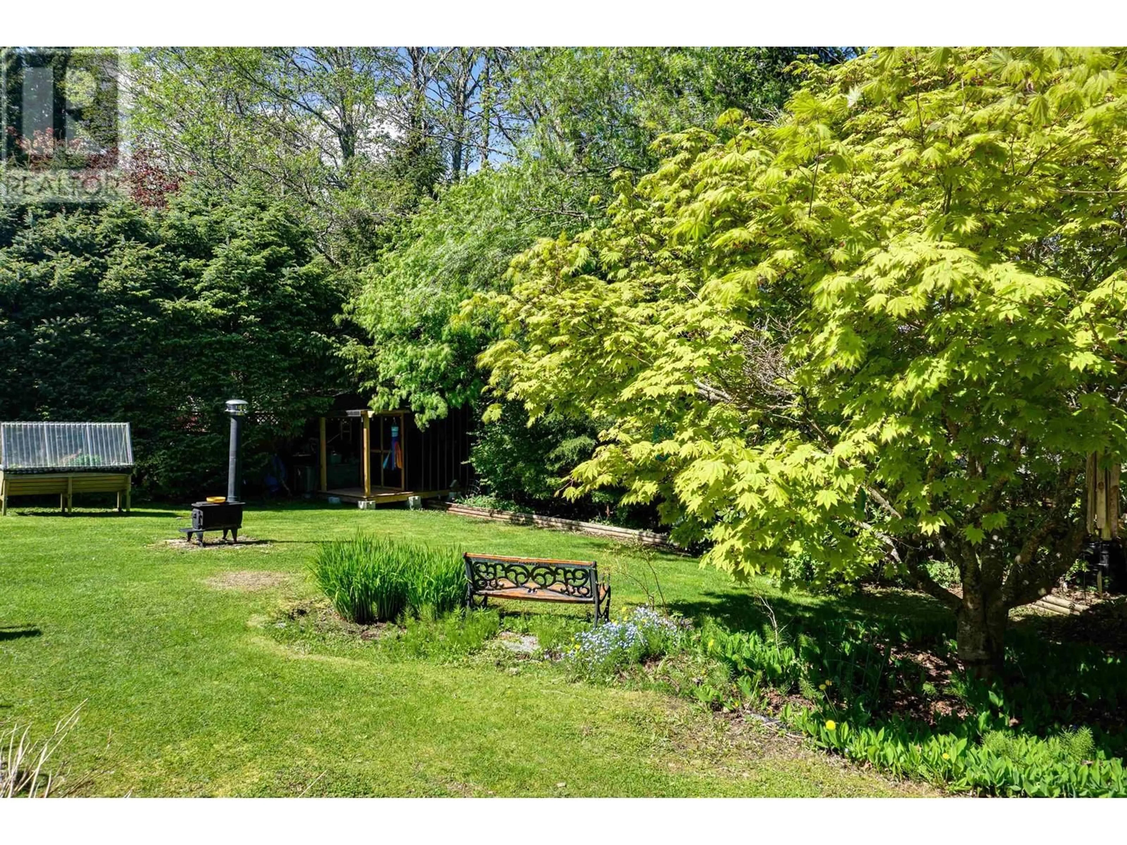 A pic from outside/outdoor area/front of a property/back of a property/a pic from drone, forest/trees view for 11 AMOS STREET, Kitimat British Columbia V8C1A5