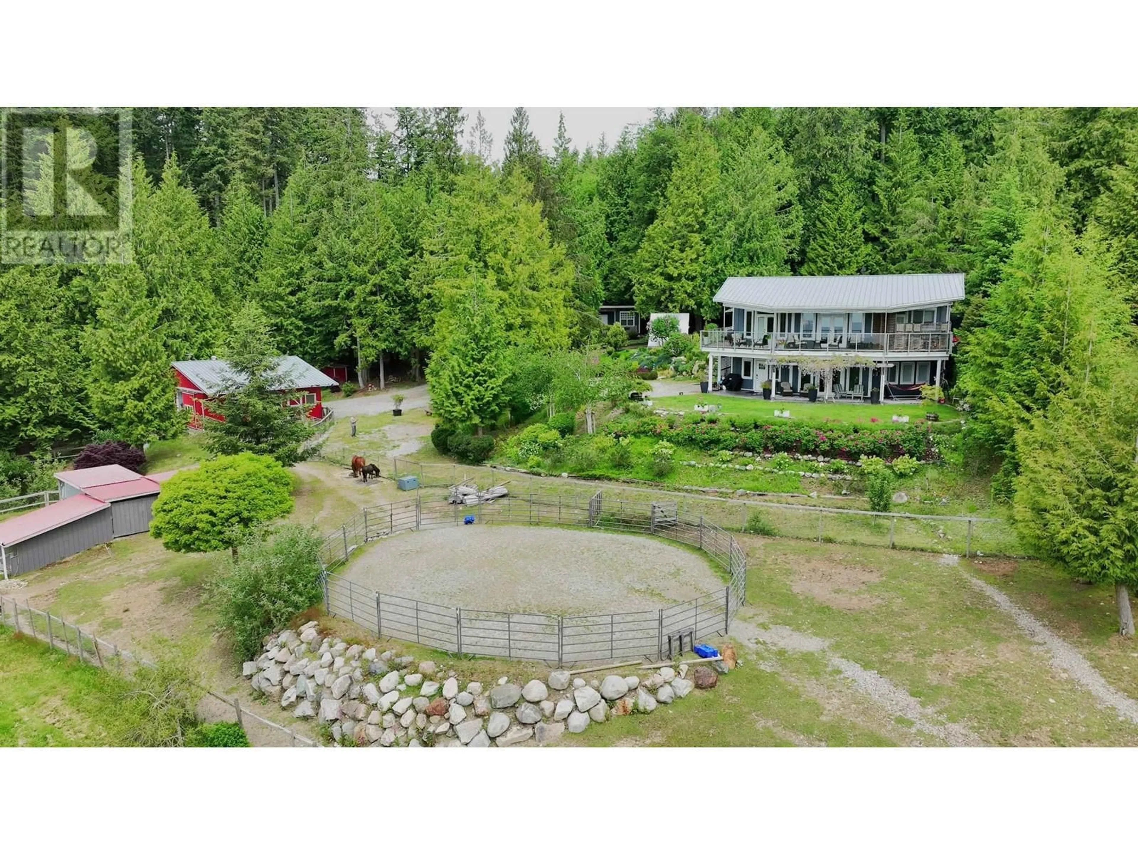 A pic from outside/outdoor area/front of a property/back of a property/a pic from drone, unknown for 1088 BYNG ROAD, Roberts Creek British Columbia V0N2W5
