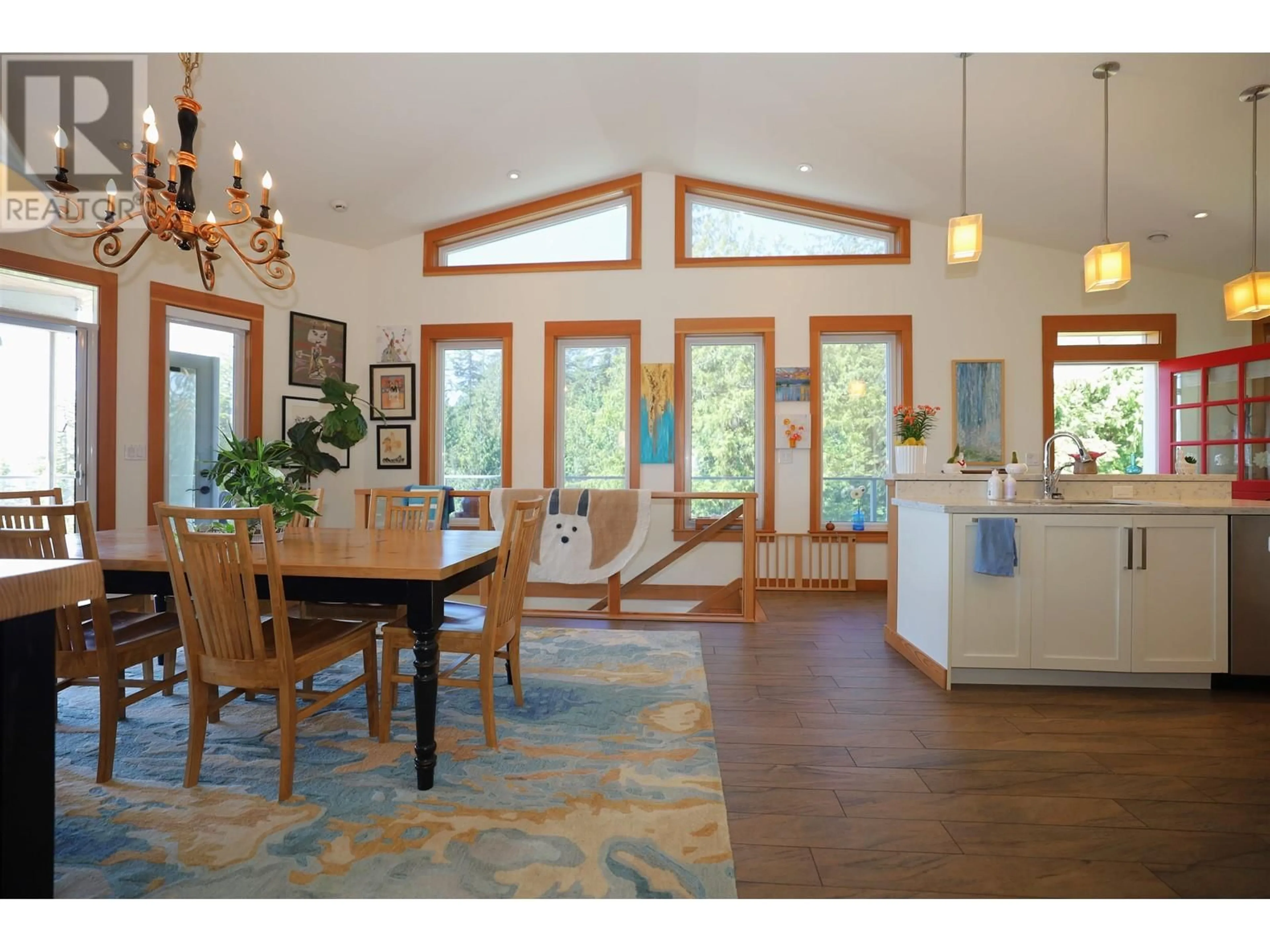 Open concept kitchen, wood/laminate floor for 1088 BYNG ROAD, Roberts Creek British Columbia V0N2W5