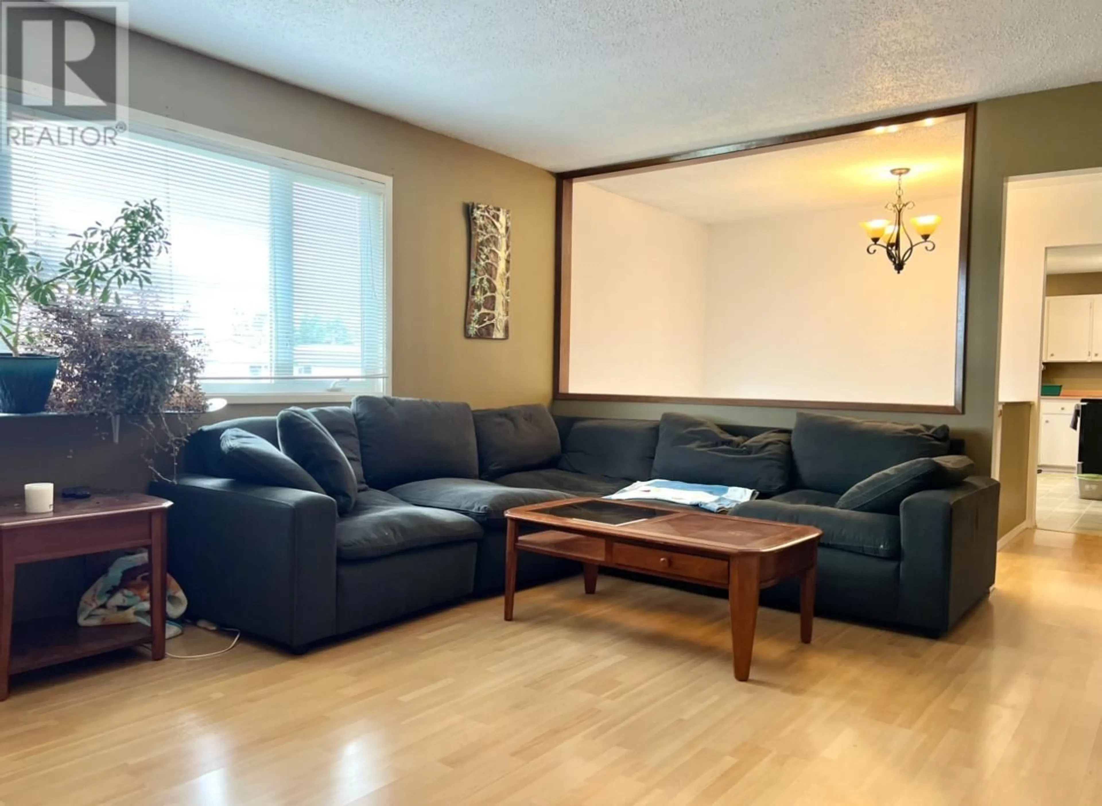 Living room with furniture, wood/laminate floor for 19 CARSWELL STREET, Kitimat British Columbia V8C1B2