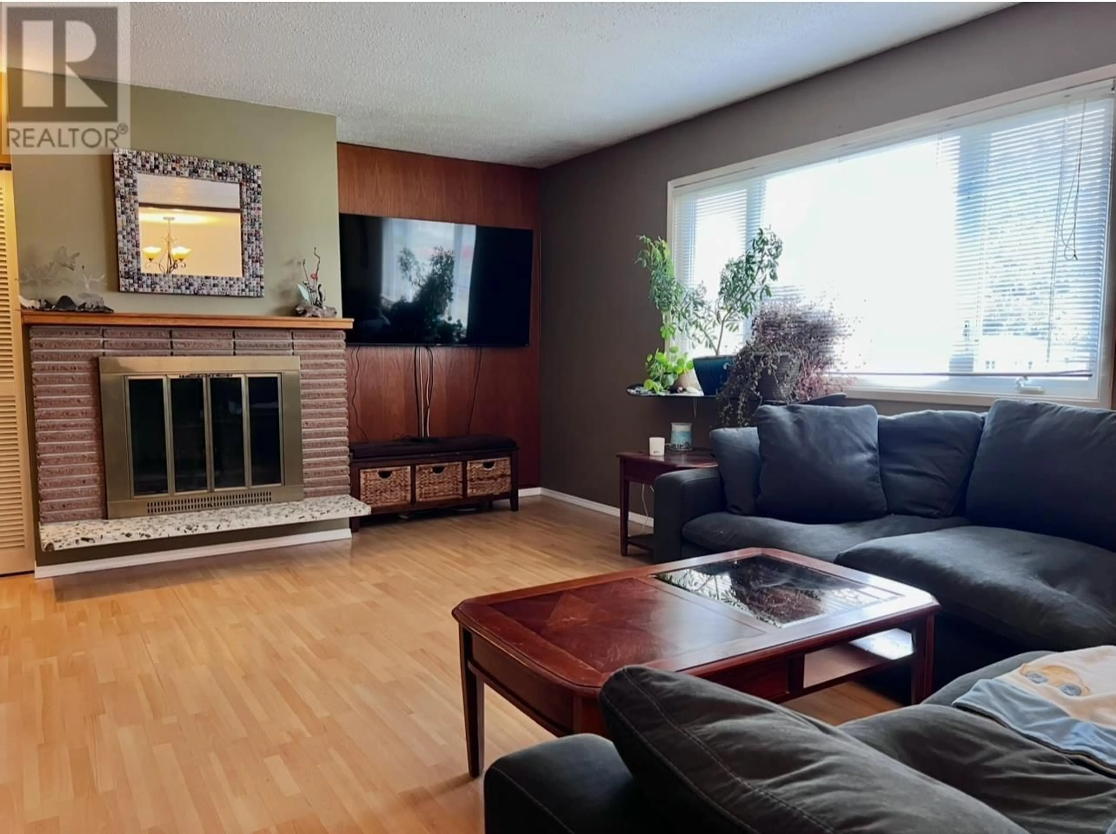 Living room with furniture, wood/laminate floor for 19 CARSWELL STREET, Kitimat British Columbia V8C1B2
