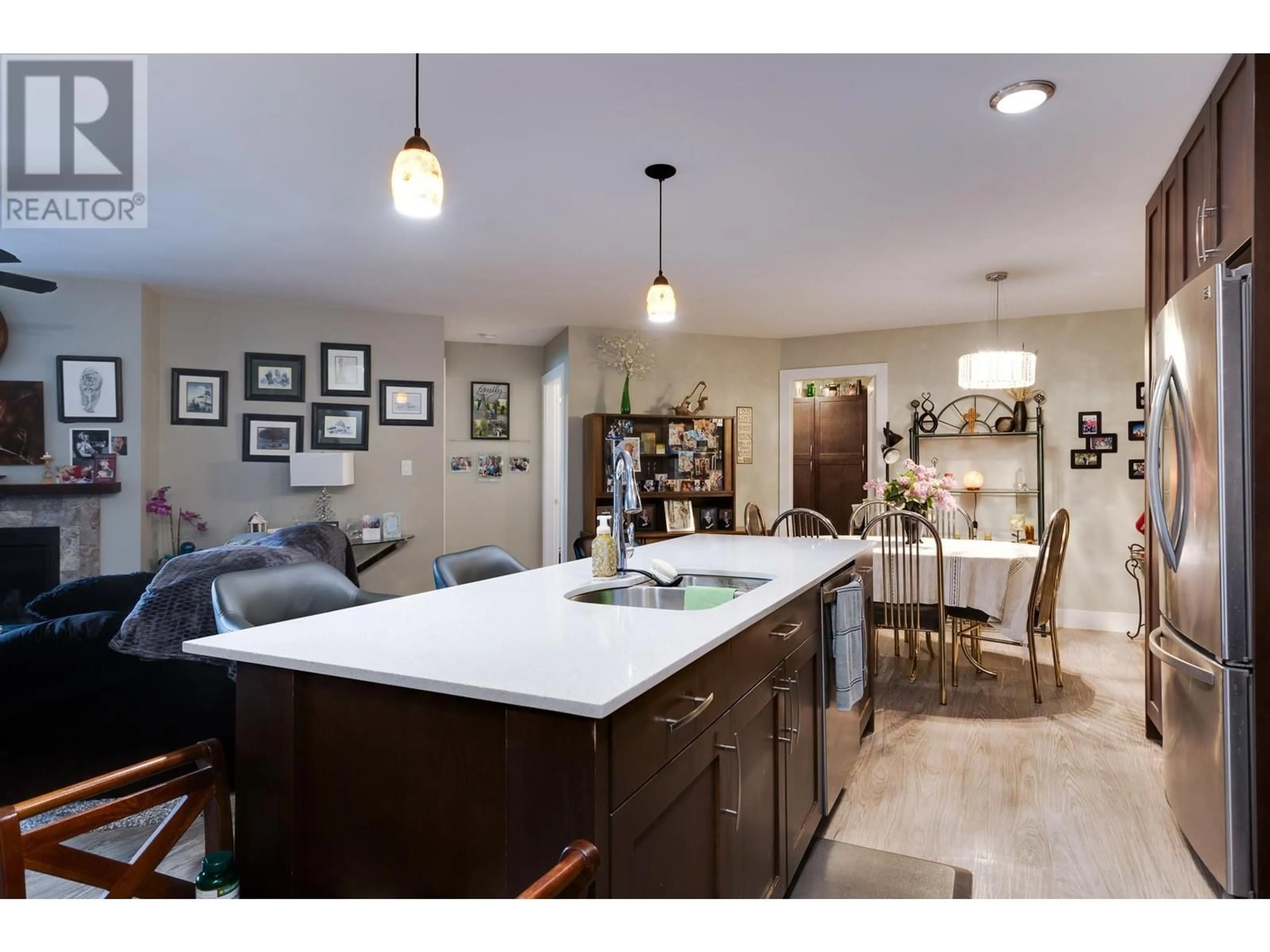 Open concept kitchen, ceramic/tile floor for 329 - 2055 INGLEDEW STREET, Prince George British Columbia V2L5S1