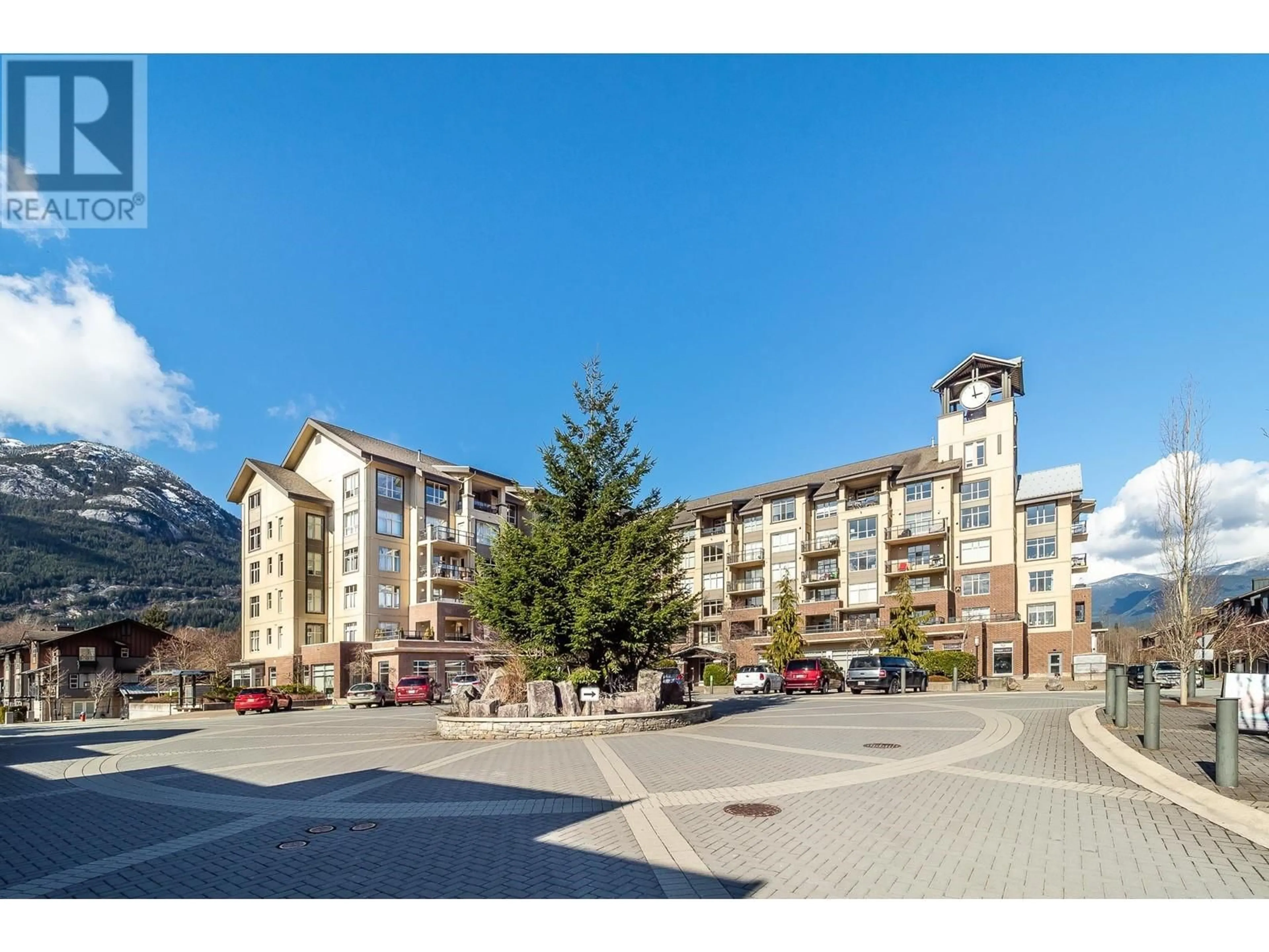A pic from outside/outdoor area/front of a property/back of a property/a pic from drone, mountain view for 320 - 1211 VILLAGE GREEN WAY, Squamish British Columbia V8B0R7