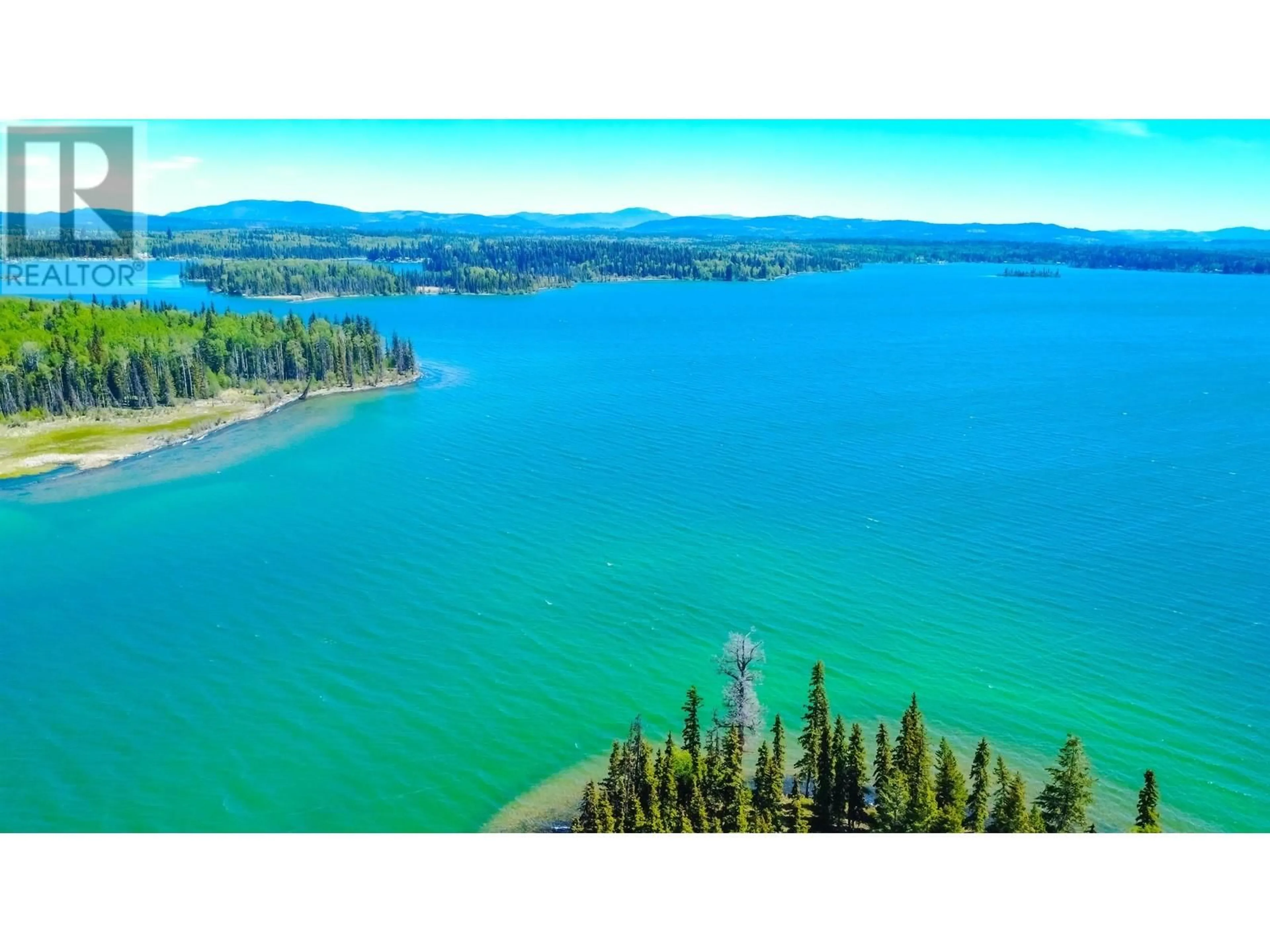 A pic from outside/outdoor area/front of a property/back of a property/a pic from drone, water/lake/river/ocean view for 7547 EDALL BAY ROAD, Bridge Lake British Columbia V0K1X1
