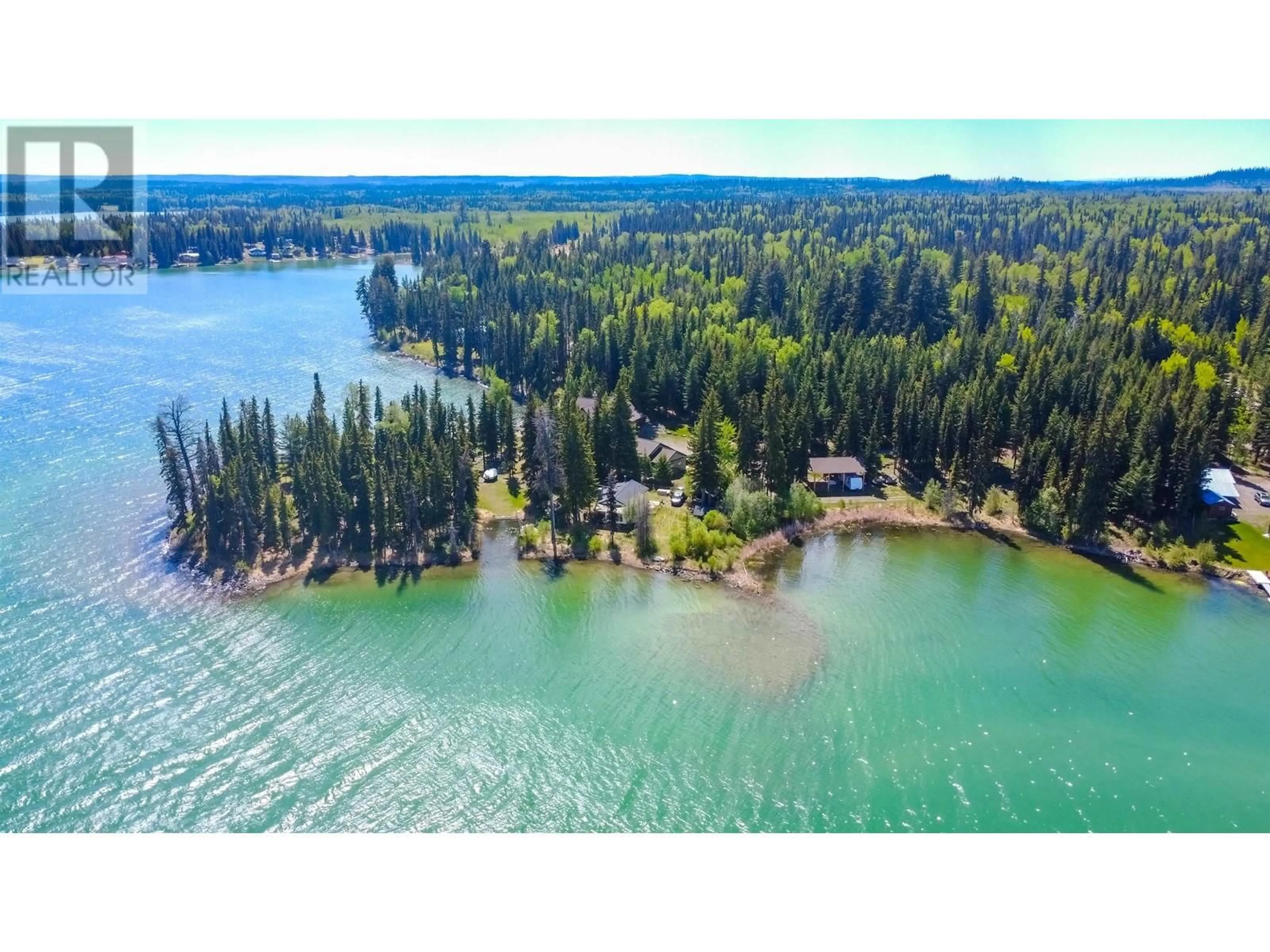 A pic from outside/outdoor area/front of a property/back of a property/a pic from drone, water/lake/river/ocean view for 7547 EDALL BAY ROAD, Bridge Lake British Columbia V0K1X1