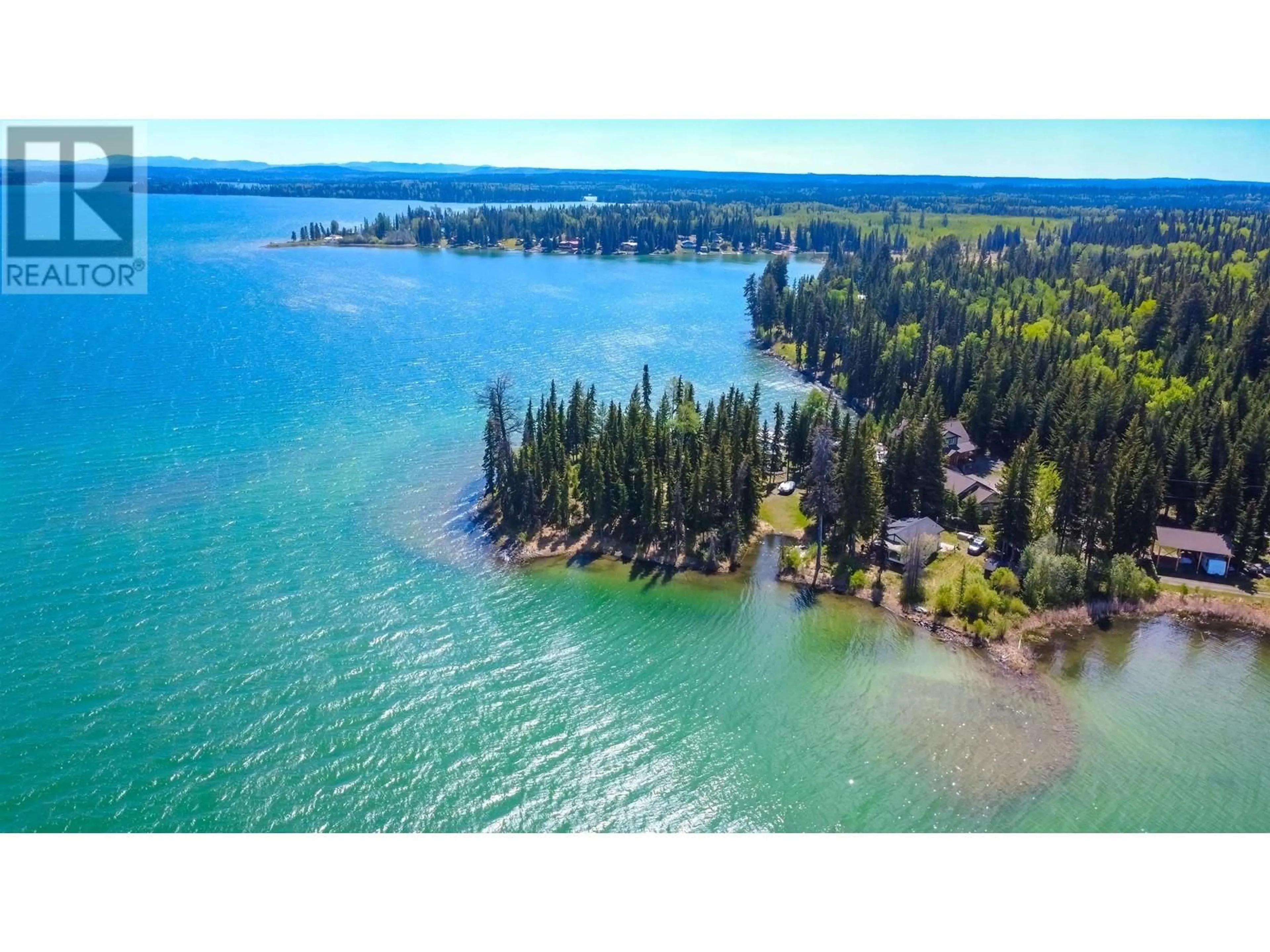 A pic from outside/outdoor area/front of a property/back of a property/a pic from drone, water/lake/river/ocean view for 7547 EDALL BAY ROAD, Bridge Lake British Columbia V0K1X1