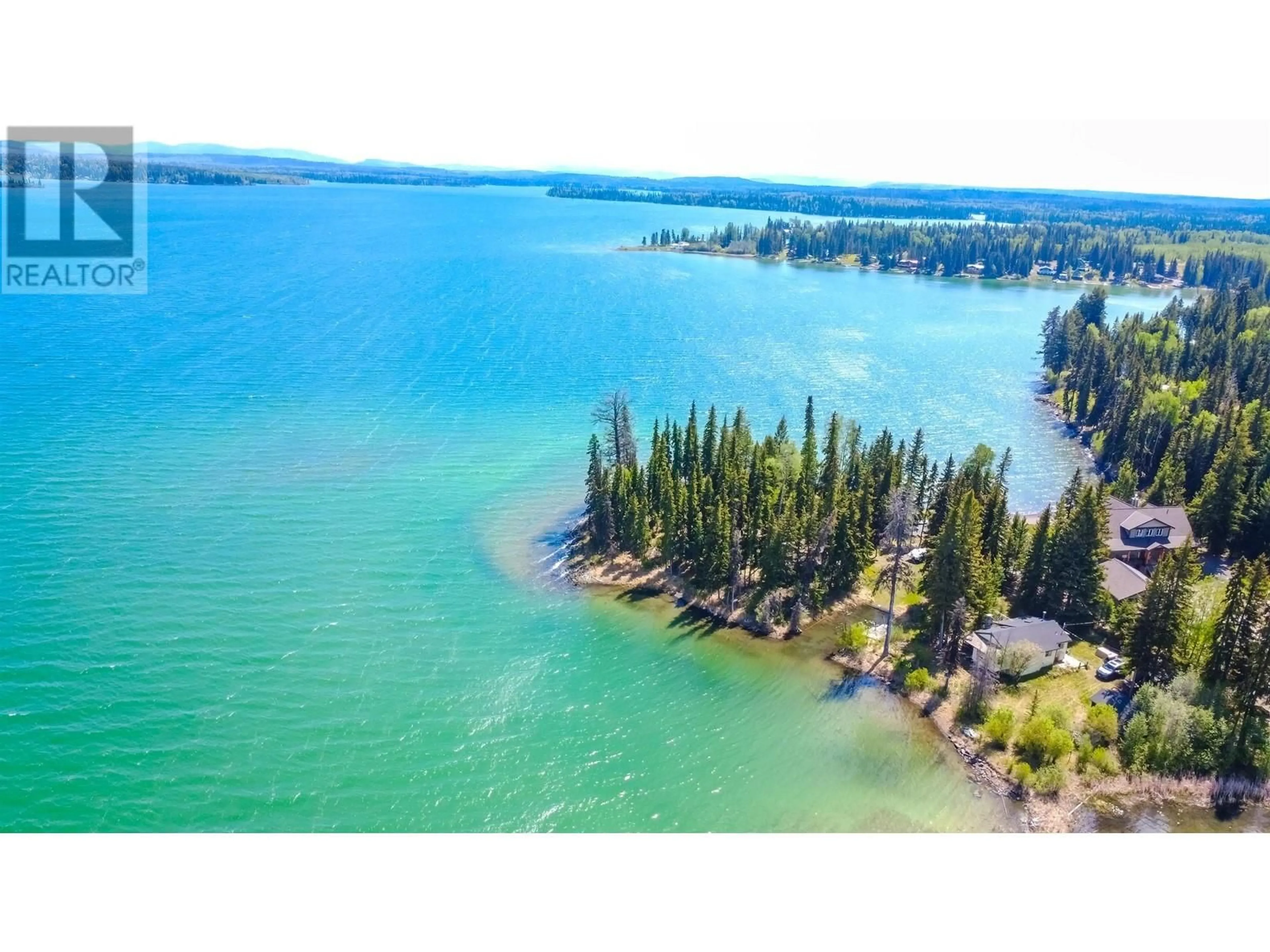 A pic from outside/outdoor area/front of a property/back of a property/a pic from drone, water/lake/river/ocean view for 7547 EDALL BAY ROAD, Bridge Lake British Columbia V0K1X1