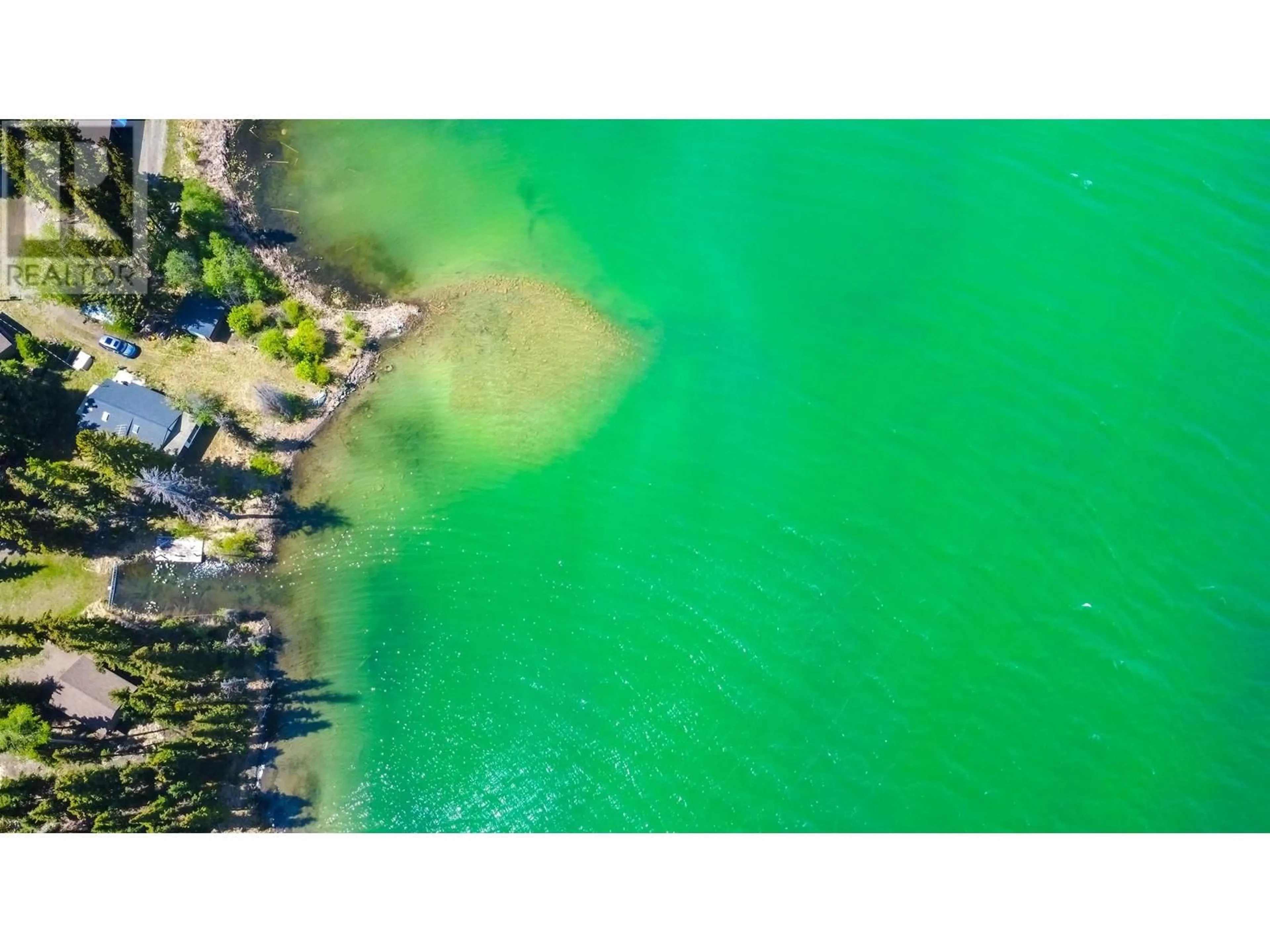 A pic from outside/outdoor area/front of a property/back of a property/a pic from drone, water/lake/river/ocean view for 7547 EDALL BAY ROAD, Bridge Lake British Columbia V0K1X1