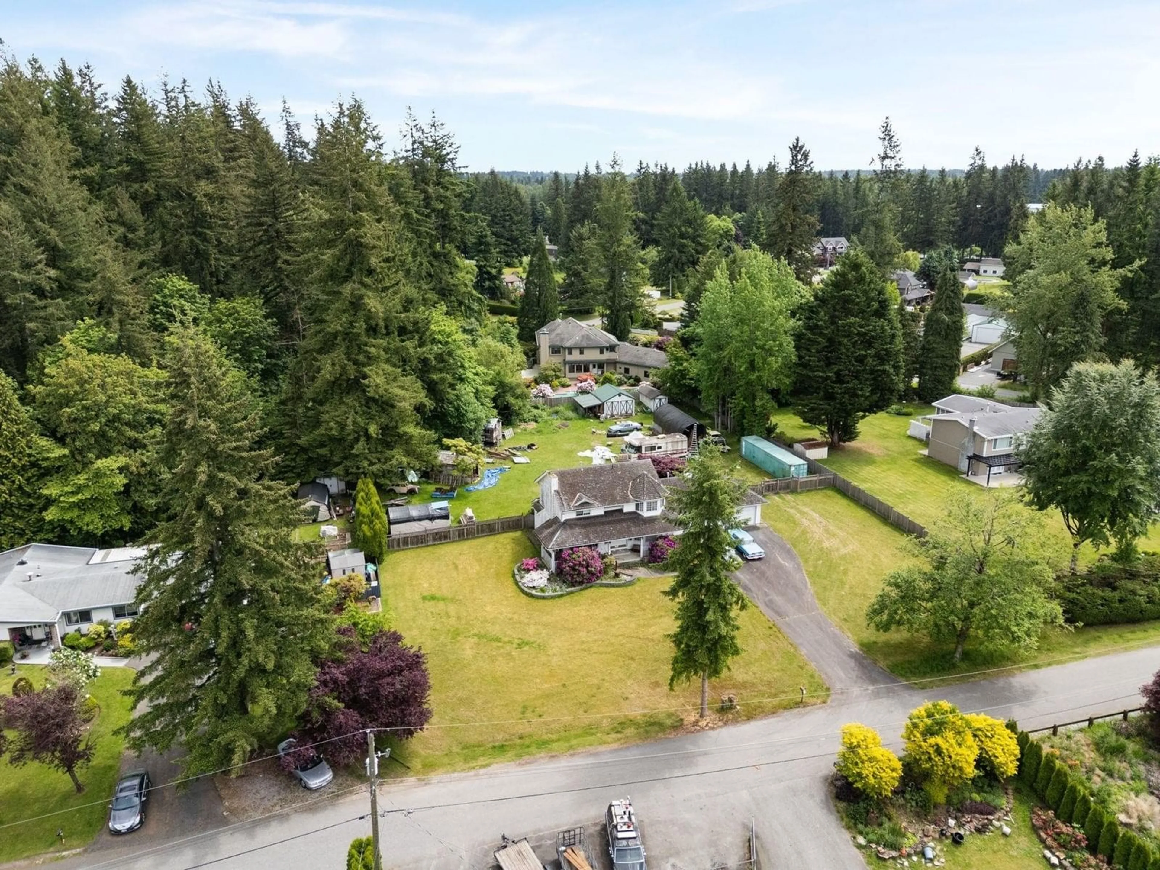 A pic from outside/outdoor area/front of a property/back of a property/a pic from drone, unknown for 5240 234, Langley British Columbia V2Z2P6