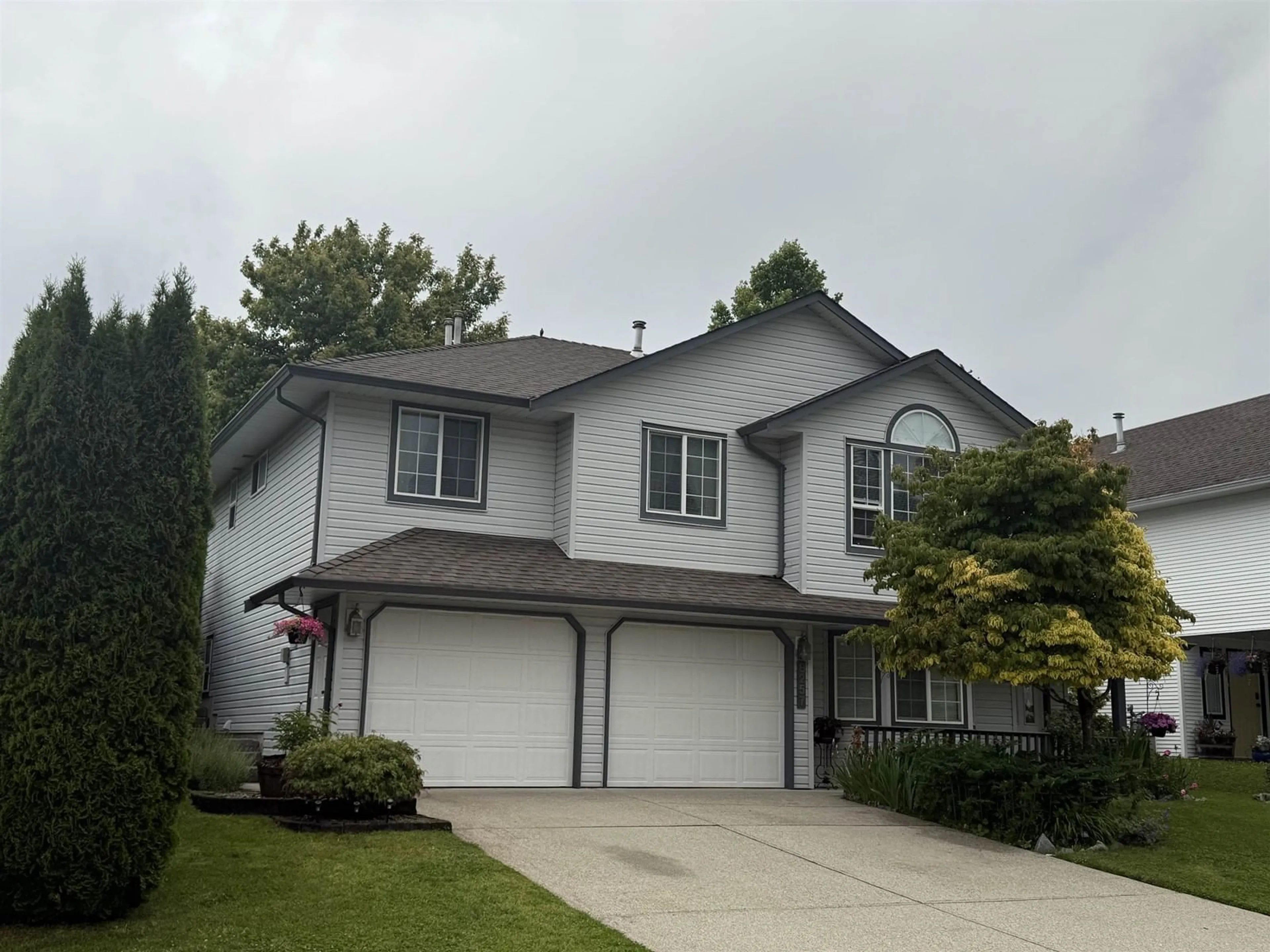 Home with vinyl exterior material, street for 8257 WHARTON, Mission British Columbia V2V7A4