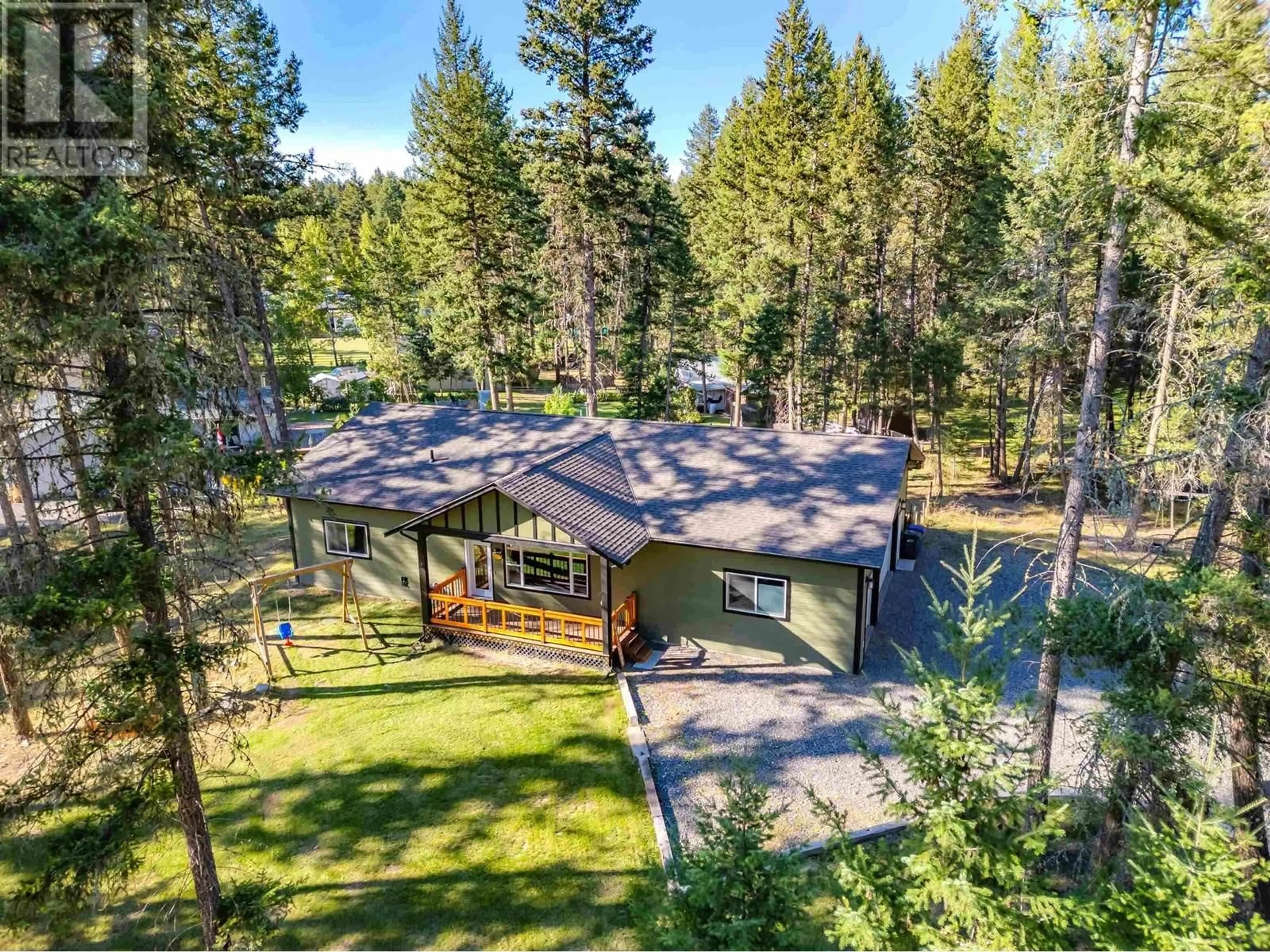 A pic from outside/outdoor area/front of a property/back of a property/a pic from drone, forest/trees view for 5065 KINNCUM ROAD, 108 Mile Ranch British Columbia V0K2Z0