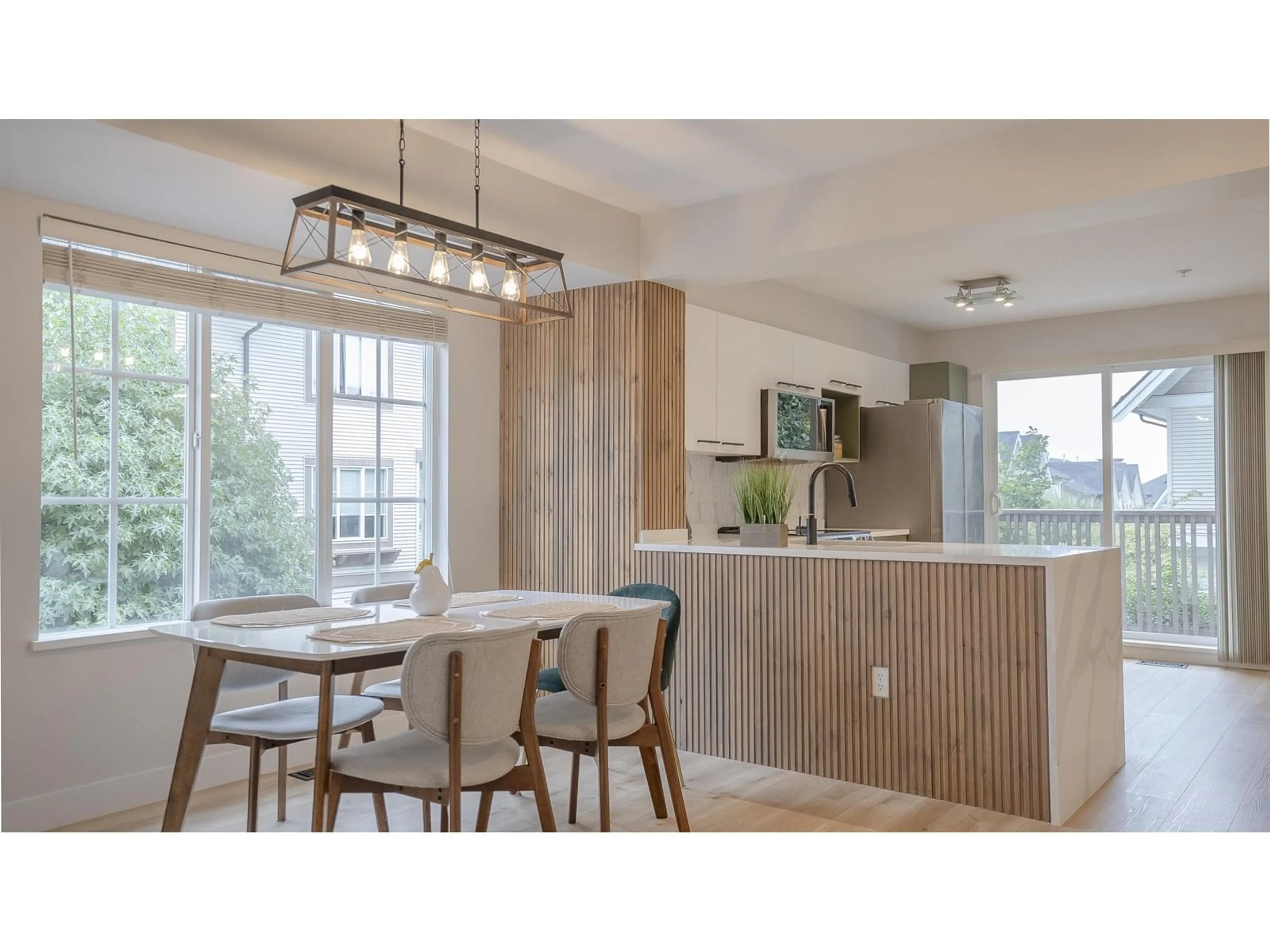 Open concept kitchen, wood/laminate floor for 22 - 20540 66, Langley British Columbia V2Y2Y7