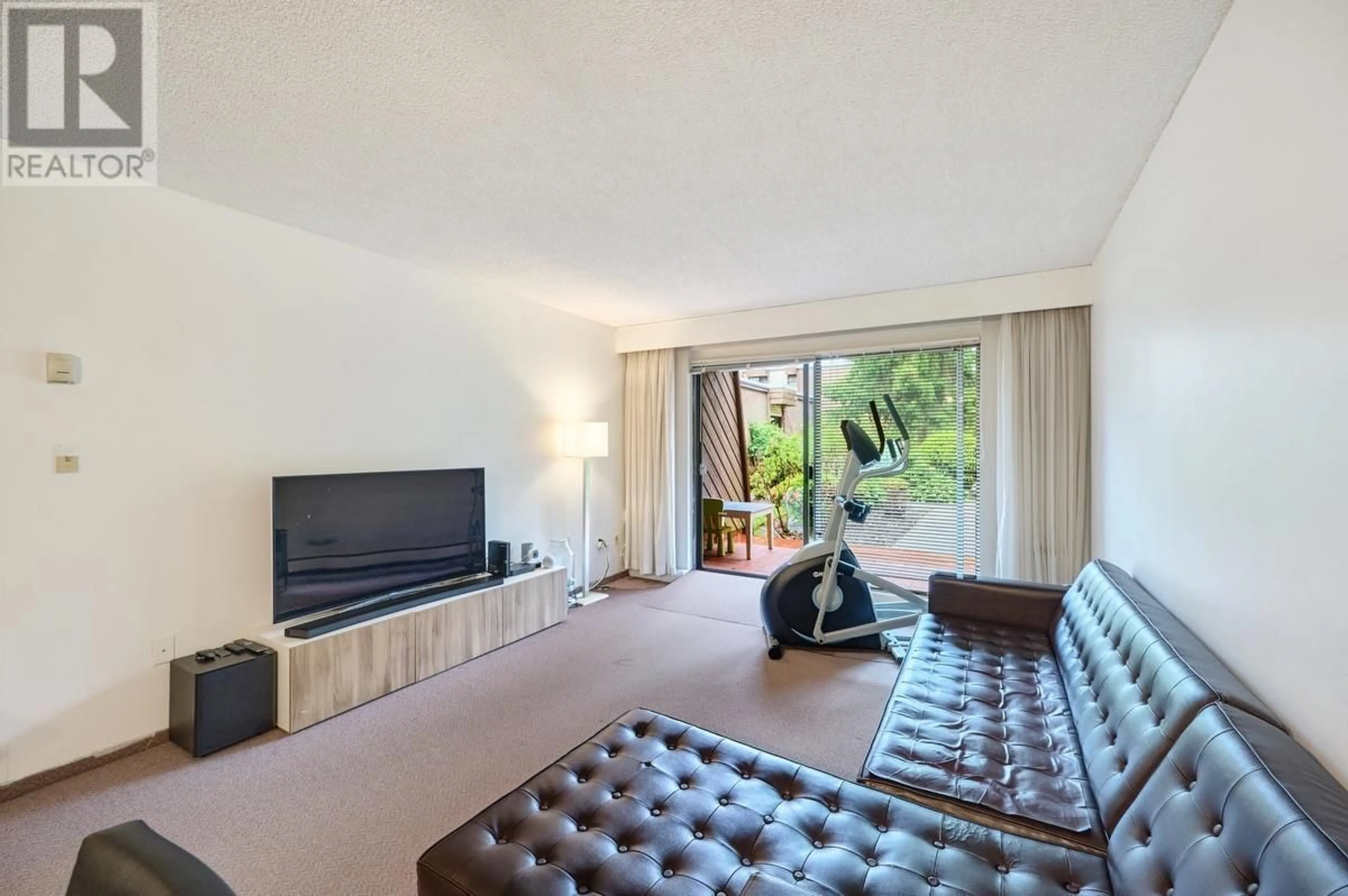 Living room with furniture, unknown for 102 - 3921 CARRIGAN COURT, Burnaby British Columbia V3N4J7