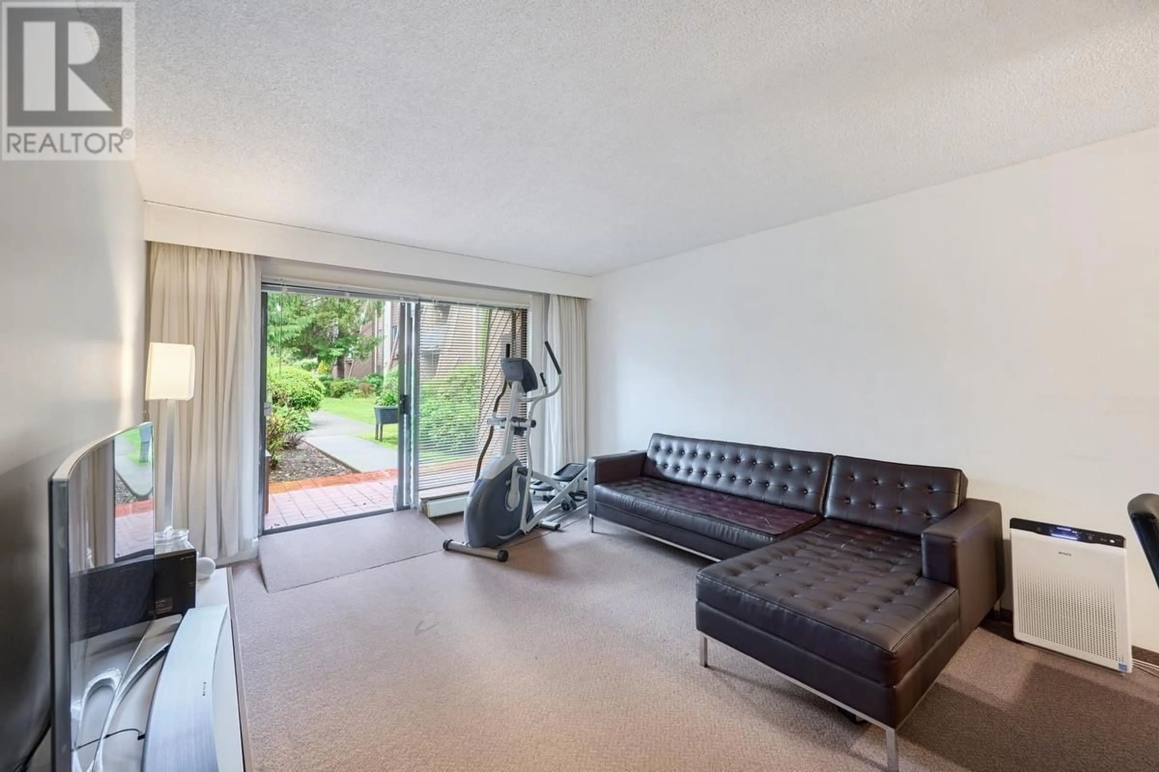 Living room with furniture, unknown for 102 - 3921 CARRIGAN COURT, Burnaby British Columbia V3N4J7