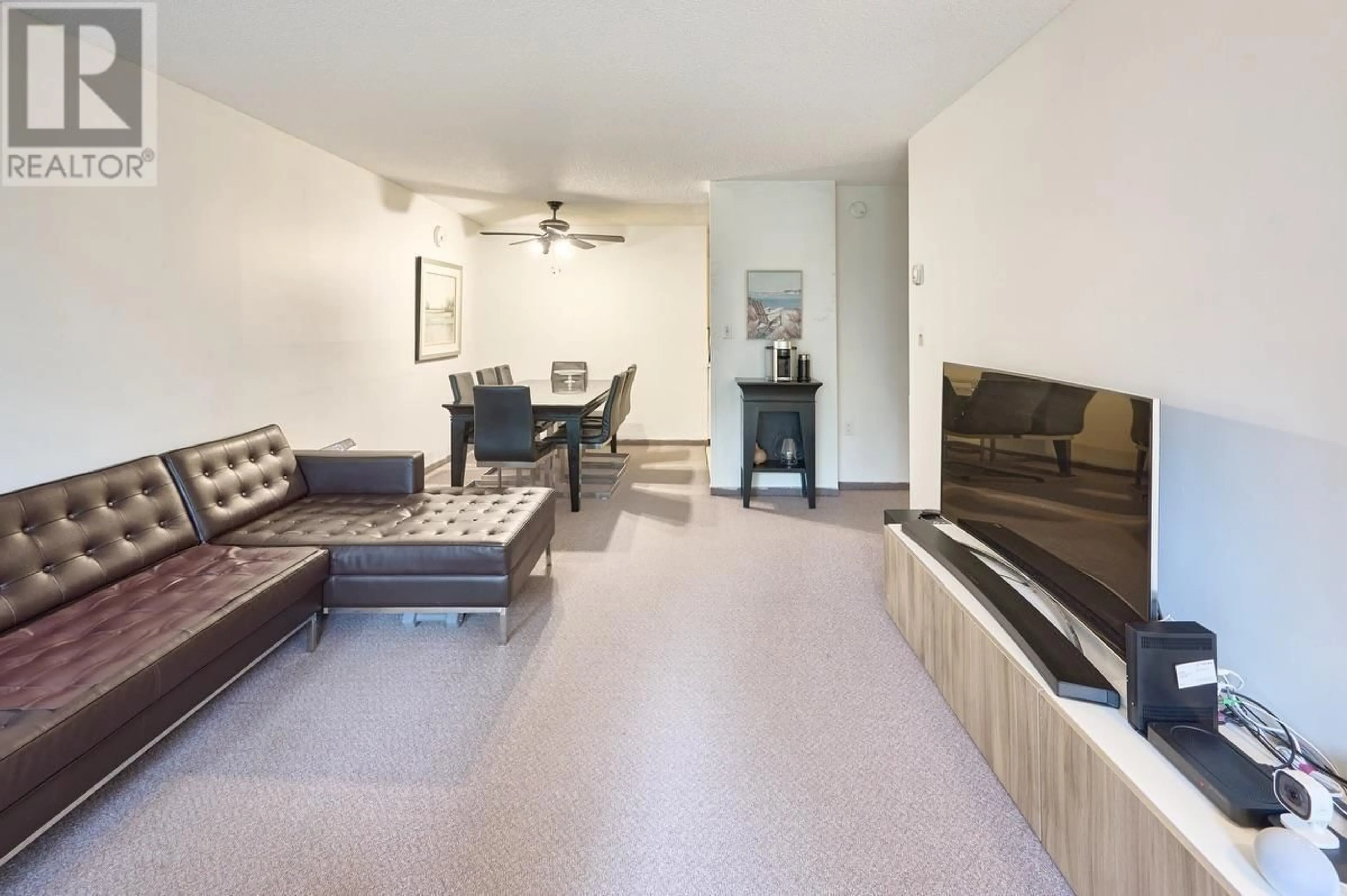 Living room with furniture, unknown for 102 - 3921 CARRIGAN COURT, Burnaby British Columbia V3N4J7