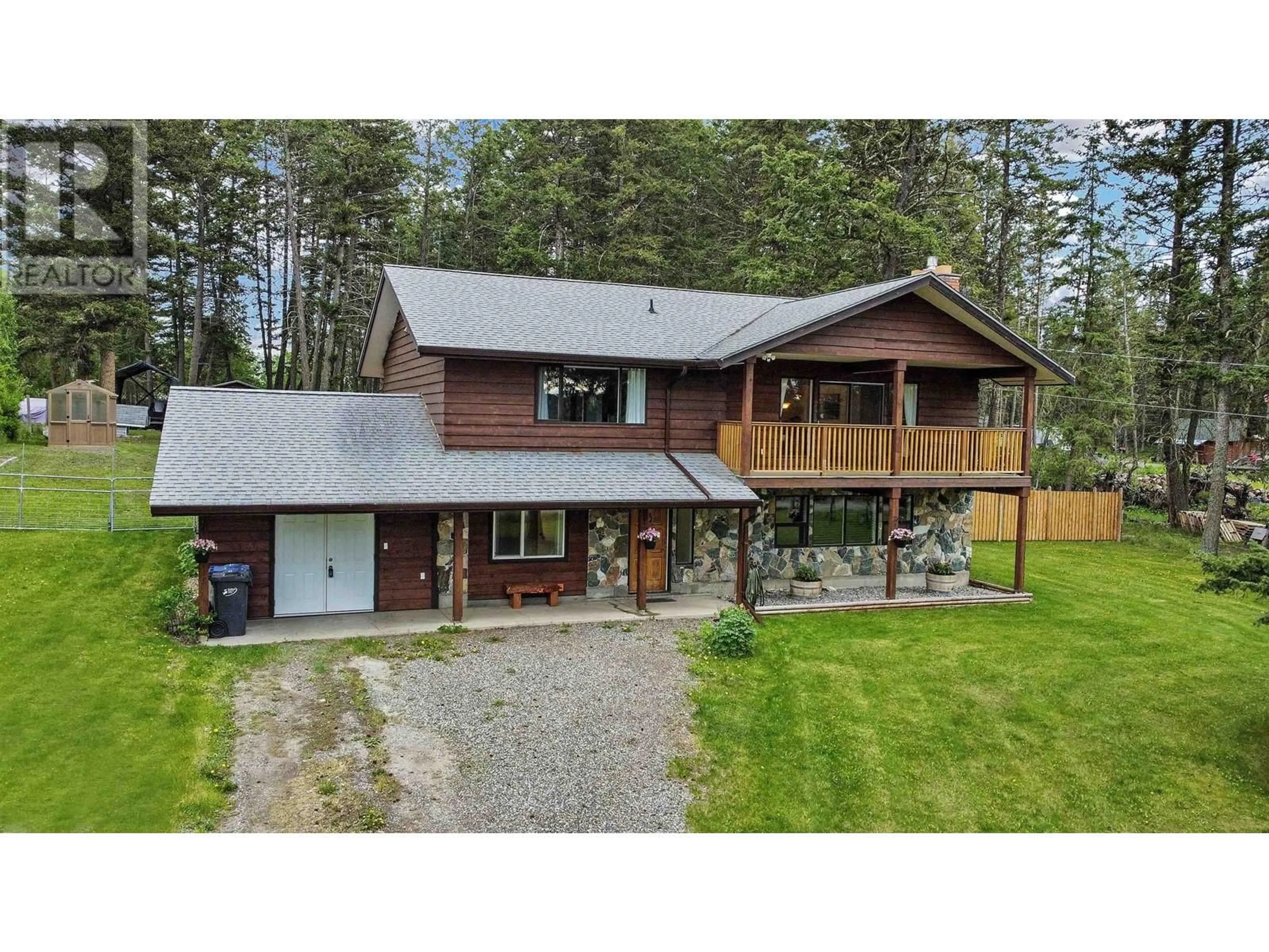 A pic from outside/outdoor area/front of a property/back of a property/a pic from drone, unknown for 5023 BLOCK DRIVE, 108 Mile Ranch British Columbia V0K2Z0