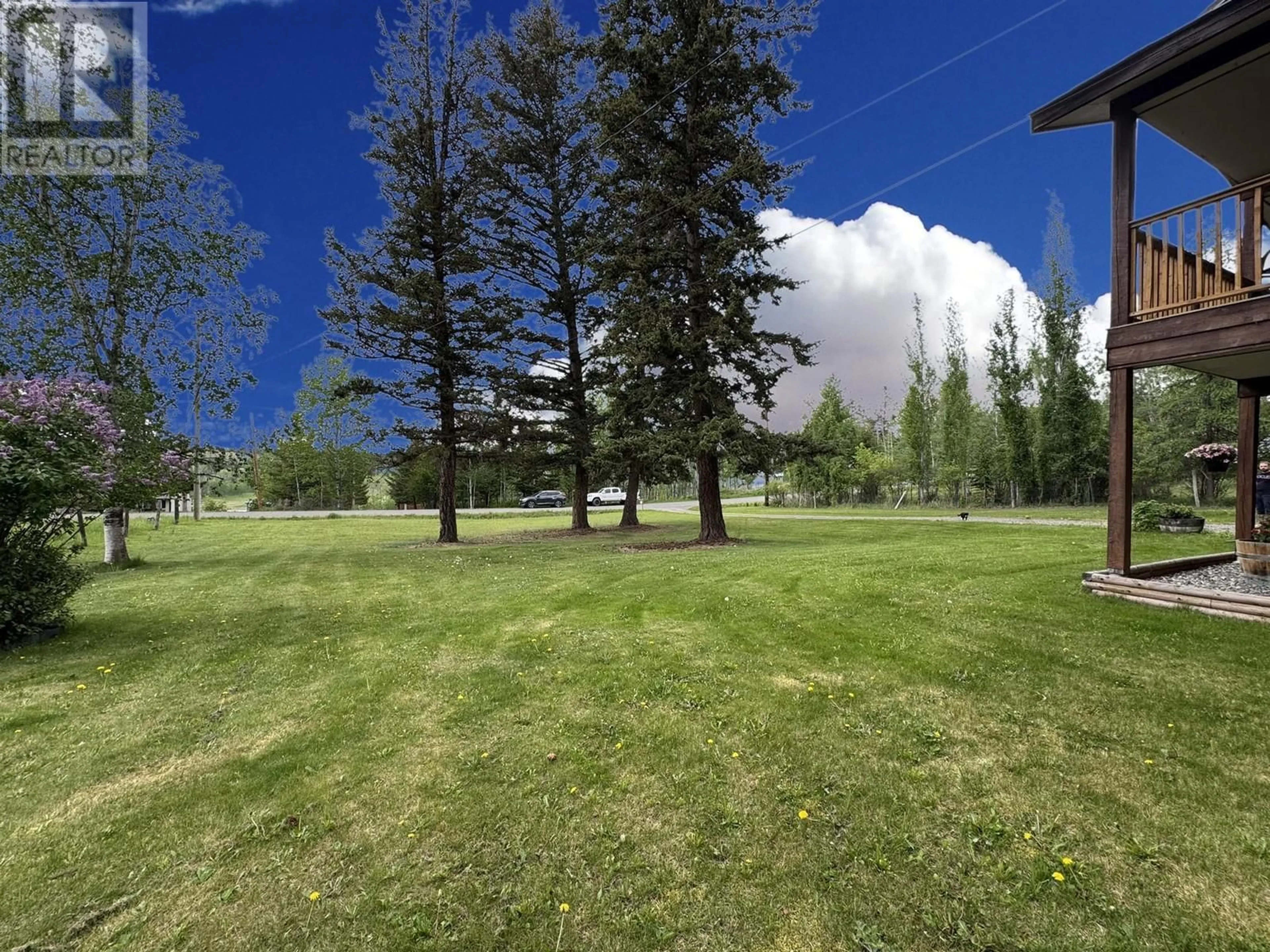 A pic from outside/outdoor area/front of a property/back of a property/a pic from drone, forest/trees view for 5023 BLOCK DRIVE, 108 Mile Ranch British Columbia V0K2Z0