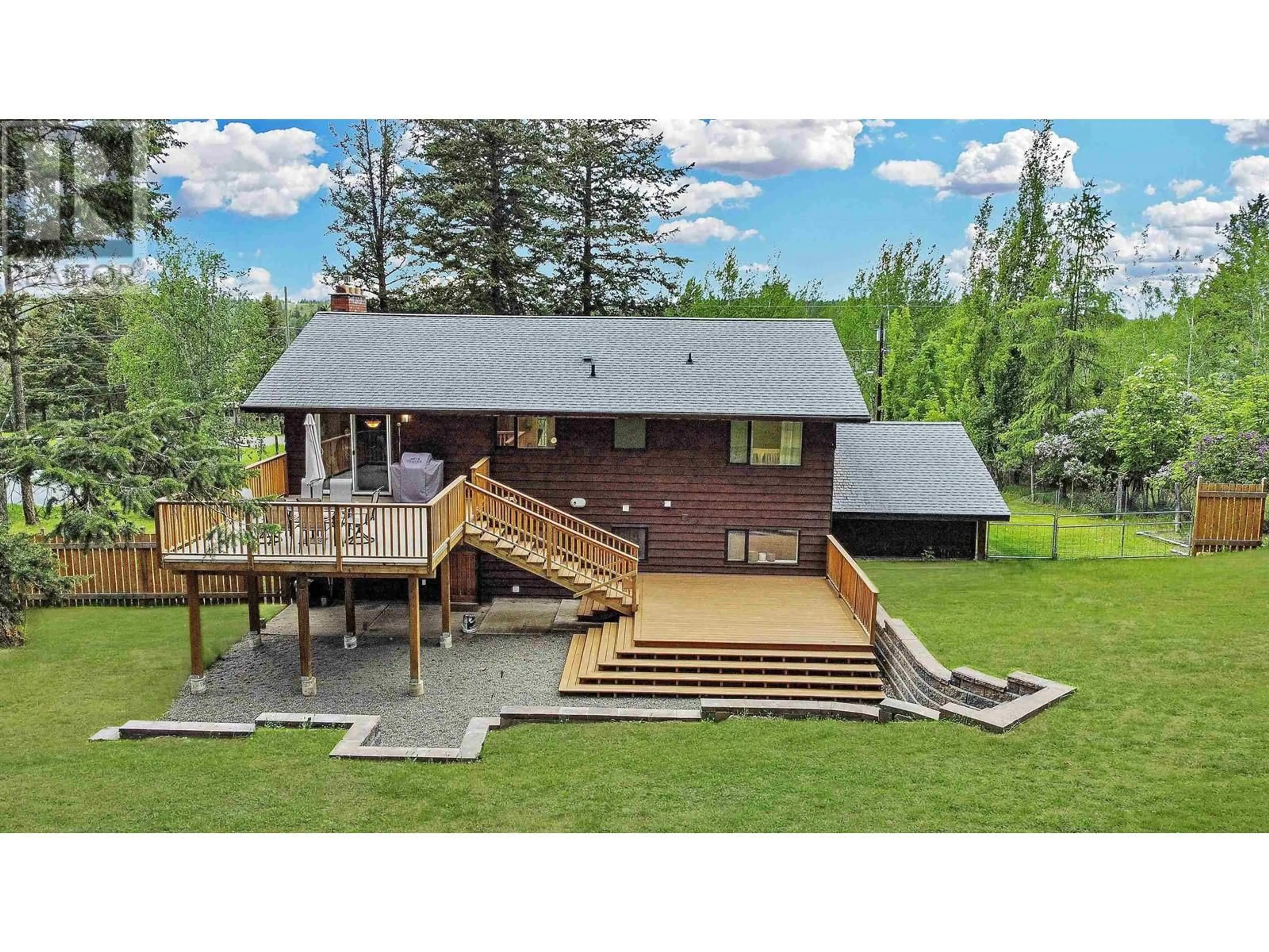 A pic from outside/outdoor area/front of a property/back of a property/a pic from drone, unknown for 5023 BLOCK DRIVE, 108 Mile Ranch British Columbia V0K2Z0