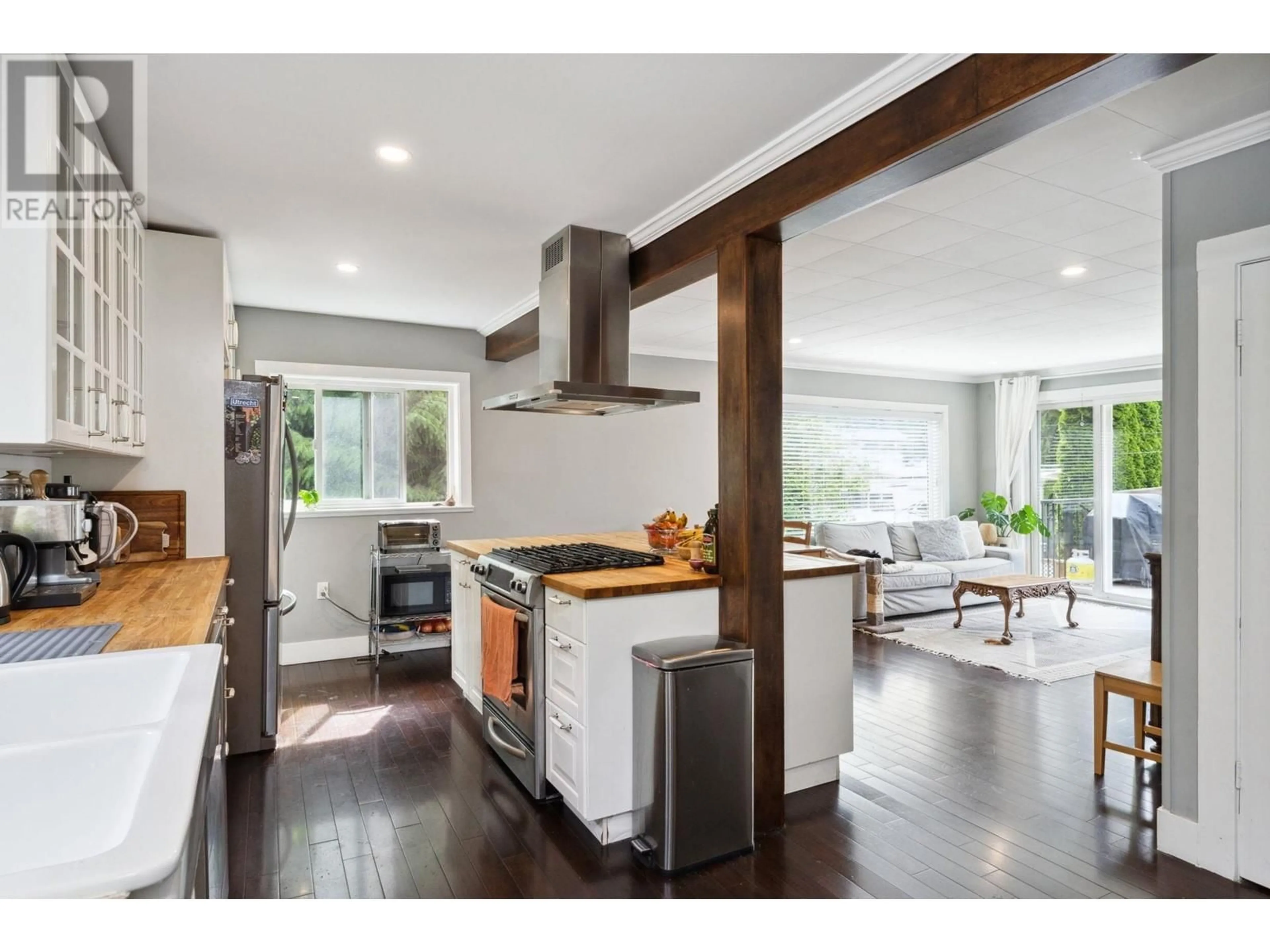 Open concept kitchen, wood/laminate floor for 38891 NEWPORT ROAD, Squamish British Columbia V8B0C9