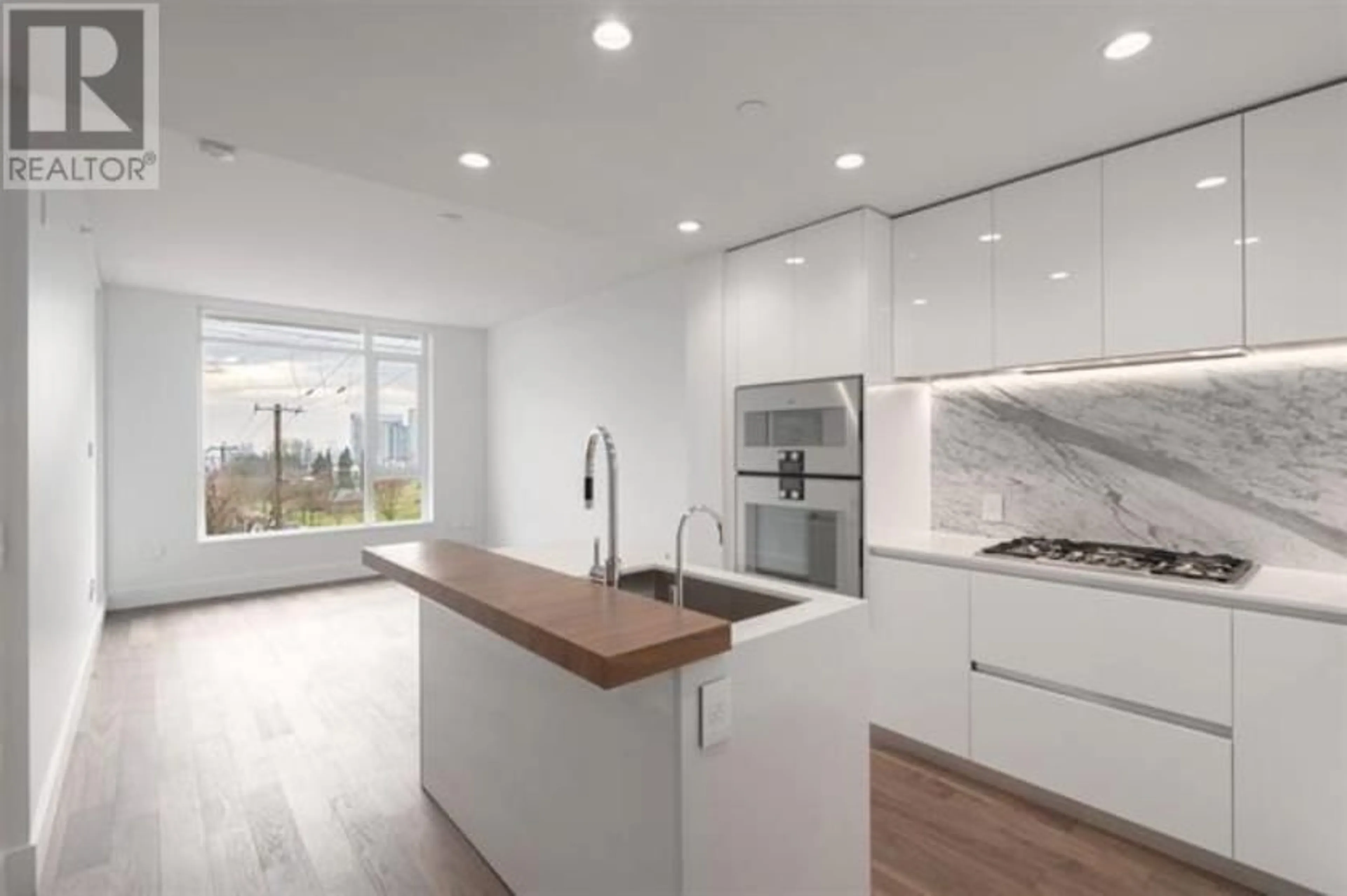 Open concept kitchen, unknown for 202 - 375 59TH AVENUE, Vancouver British Columbia V5X0J4