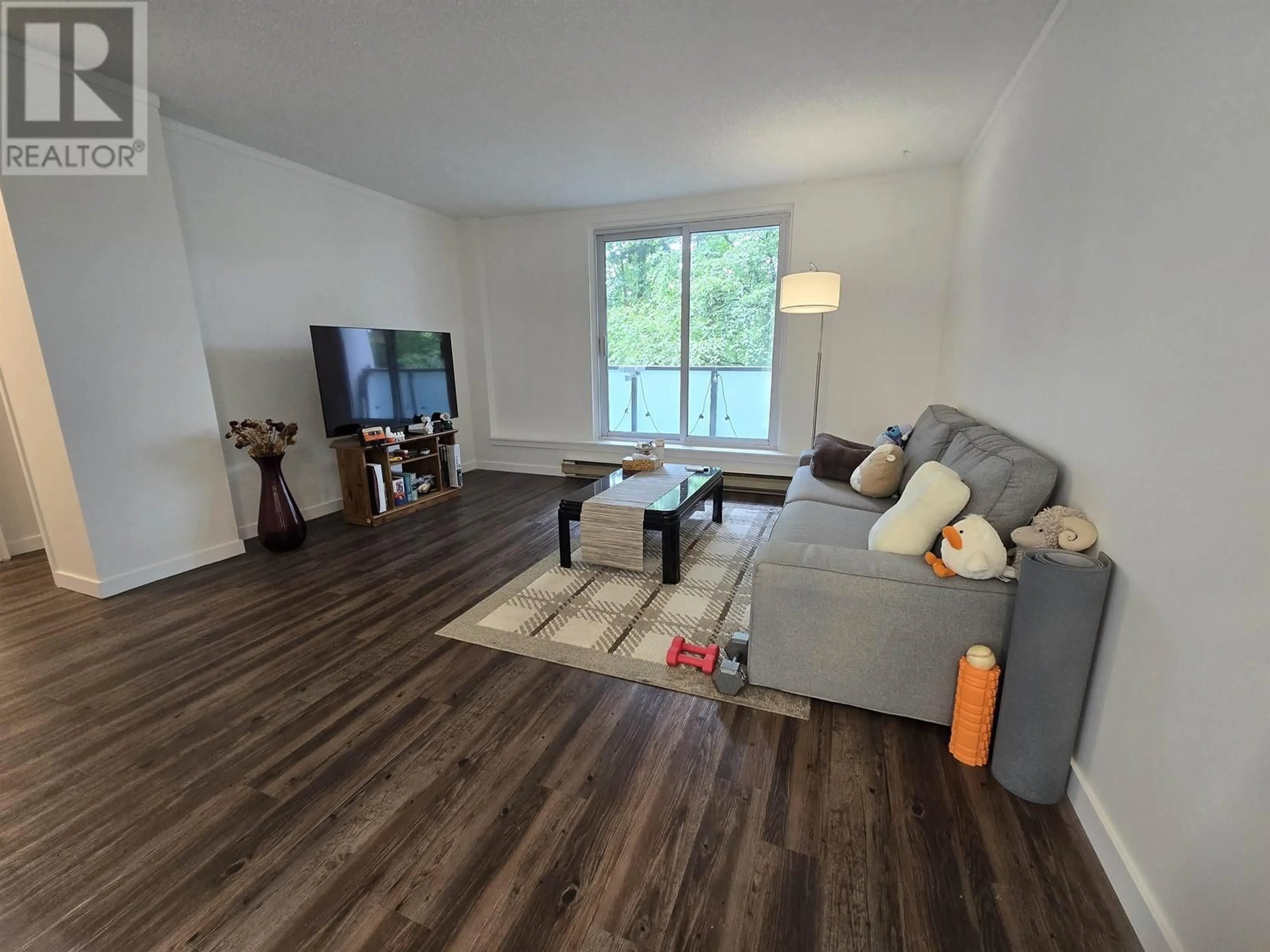 Living room with furniture, wood/laminate floor for 305 - 9541 ERICKSON DRIVE, Burnaby British Columbia V3J7N8