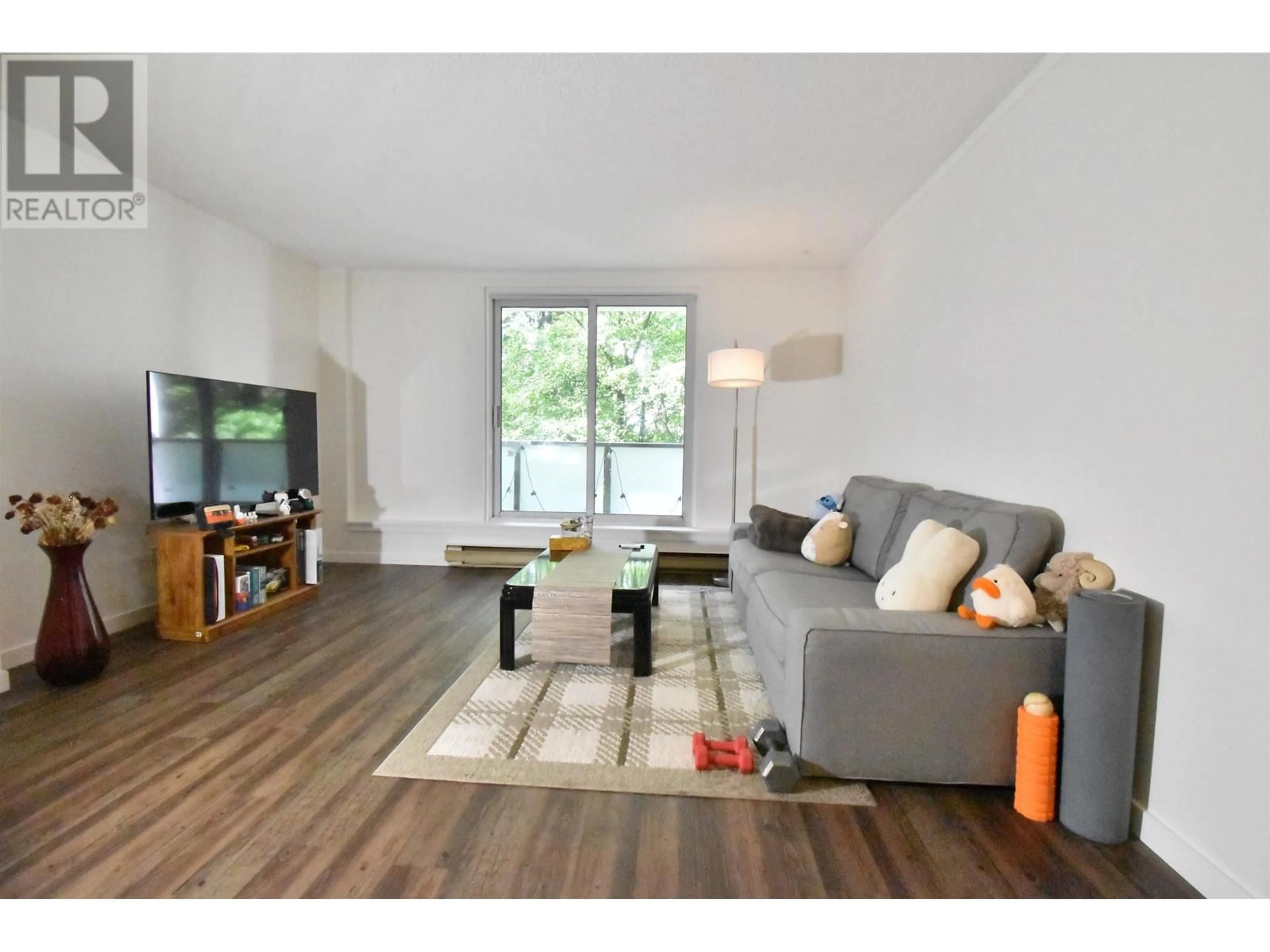 Living room with furniture, wood/laminate floor for 305 - 9541 ERICKSON DRIVE, Burnaby British Columbia V3J7N8