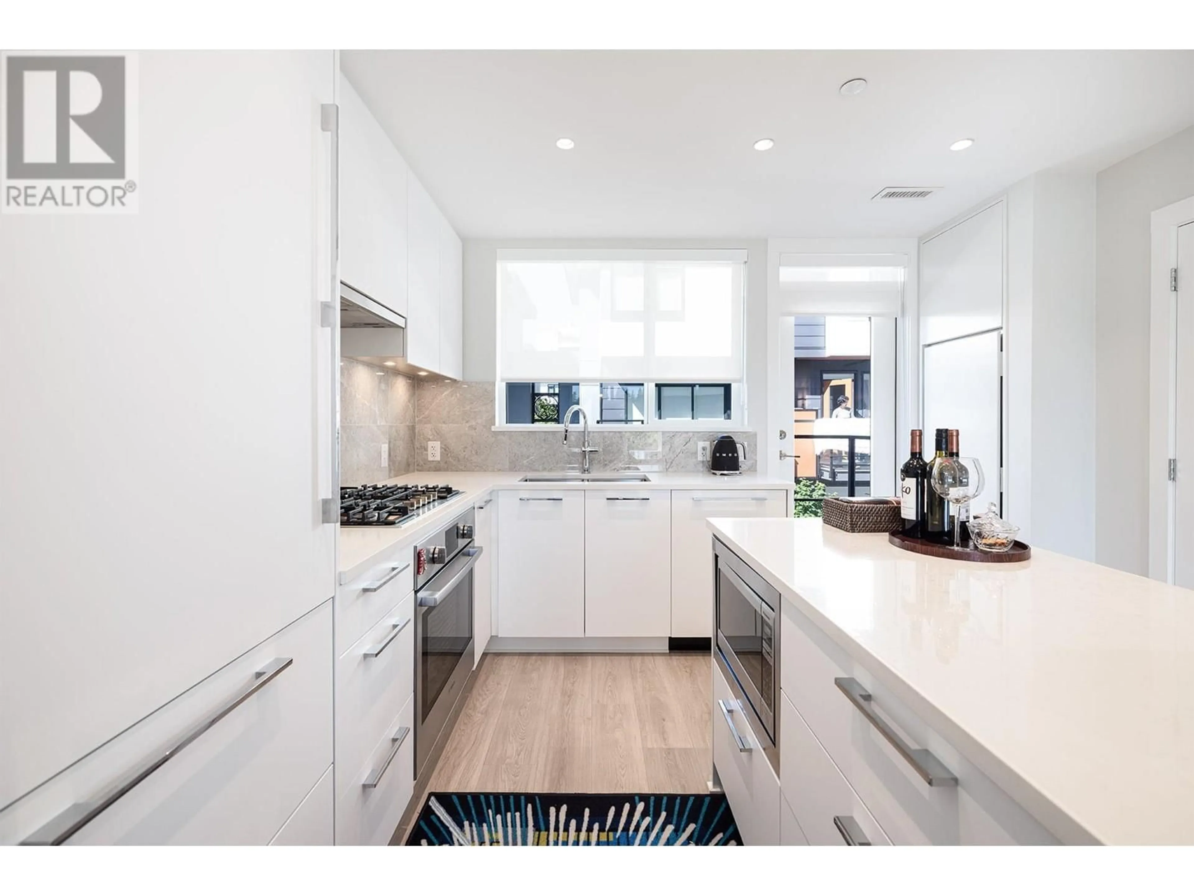 Contemporary kitchen, unknown for 103 - 5370 CROOKED BRANCH ROAD, Vancouver British Columbia V6T0E6
