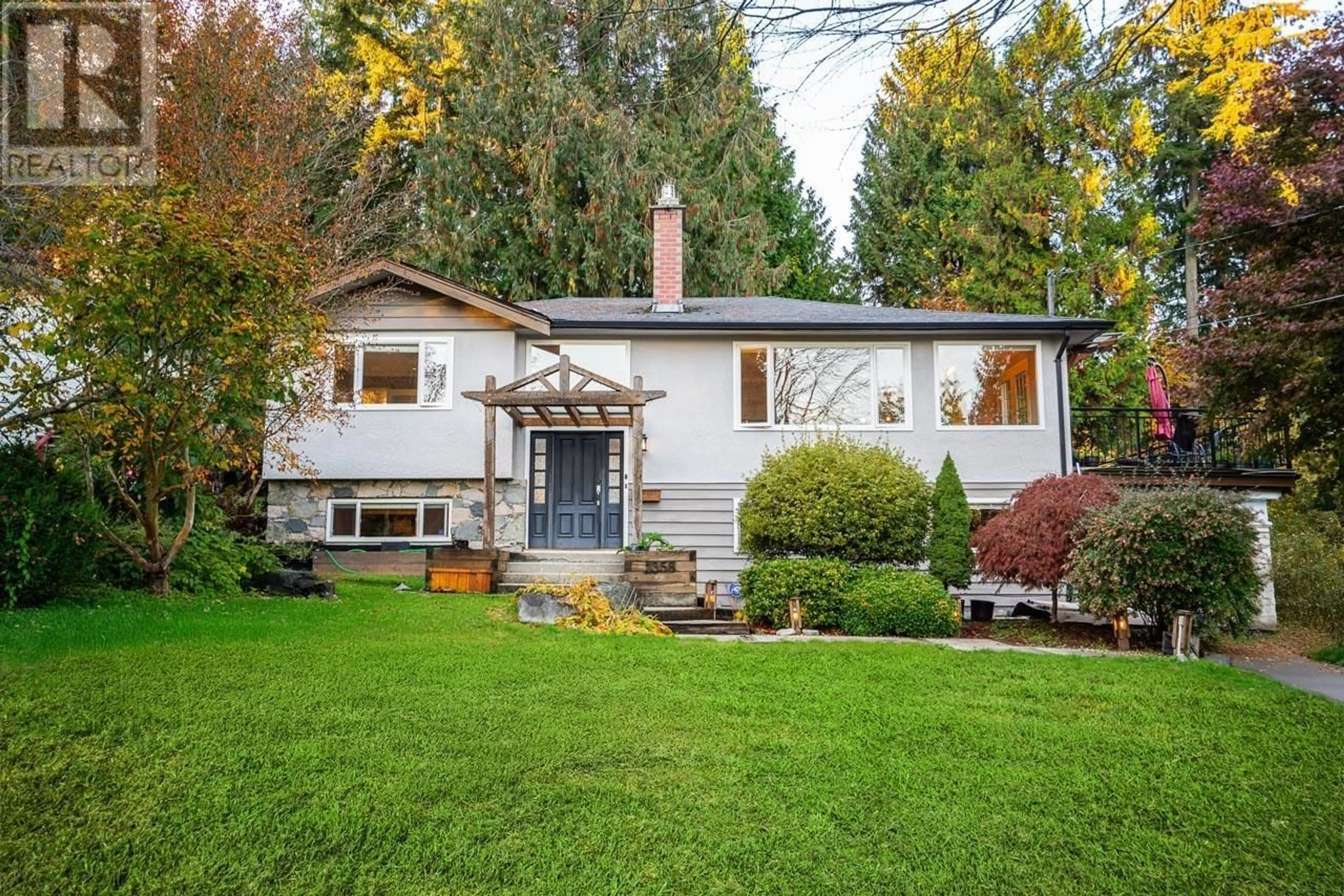 Home with vinyl exterior material, street for 1358 14TH STREET, North Vancouver British Columbia V7J1K4