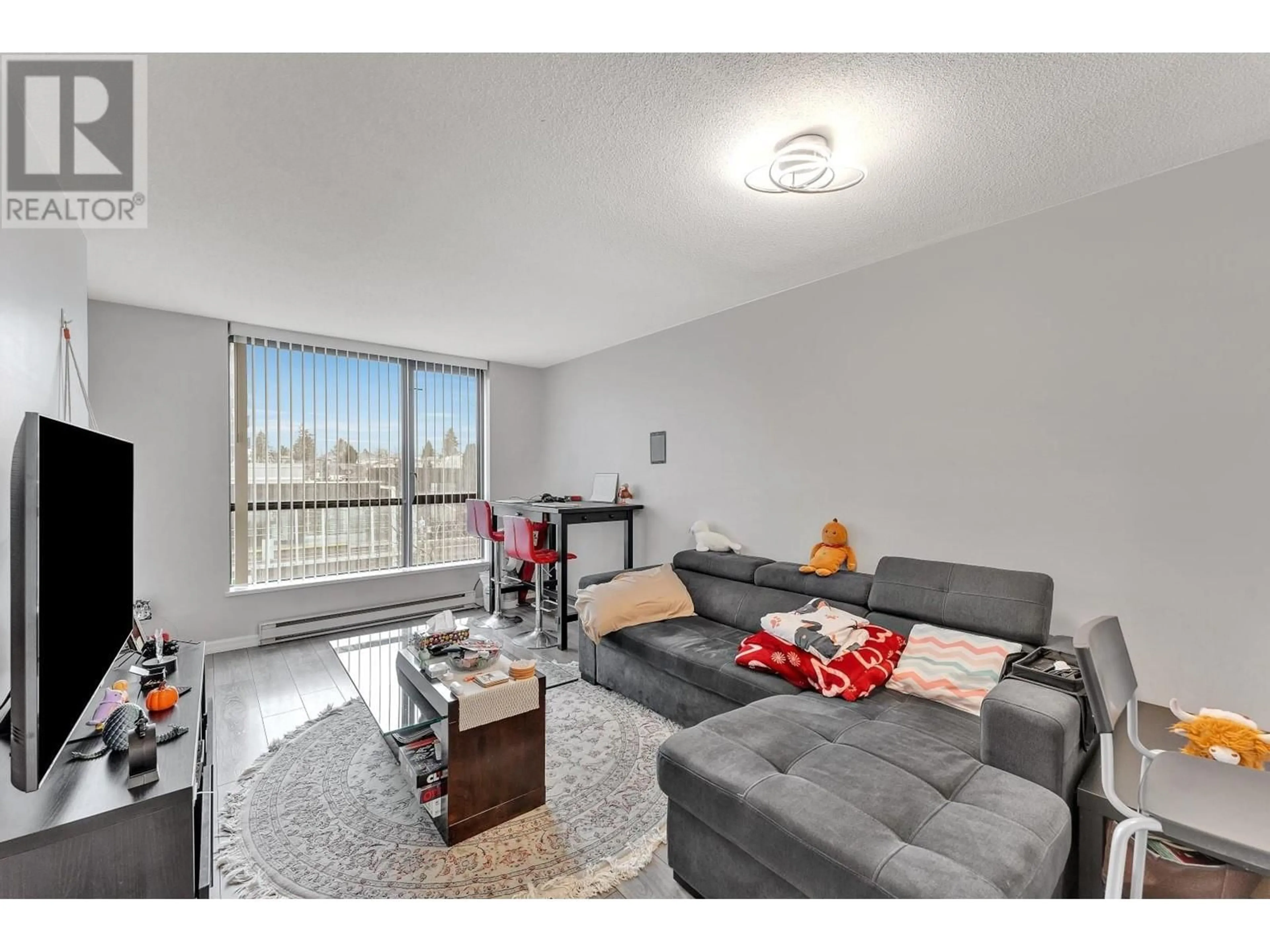 Living room with furniture, unknown for 502 - 3438 VANNESS AVENUE, Vancouver British Columbia V5R6E7