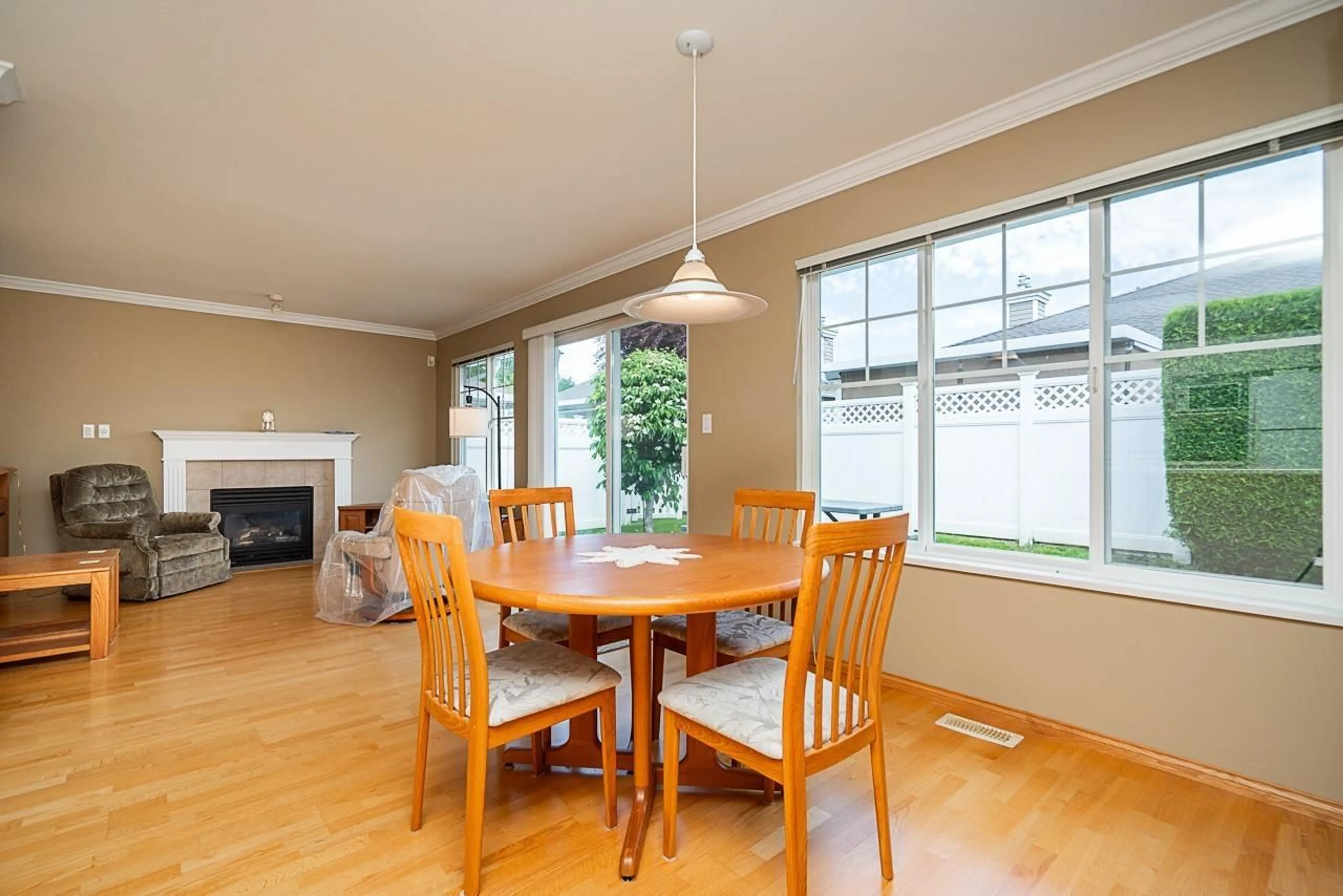 Dining room, wood/laminate floor for 23 - 6885 184, Surrey British Columbia V3S9G1