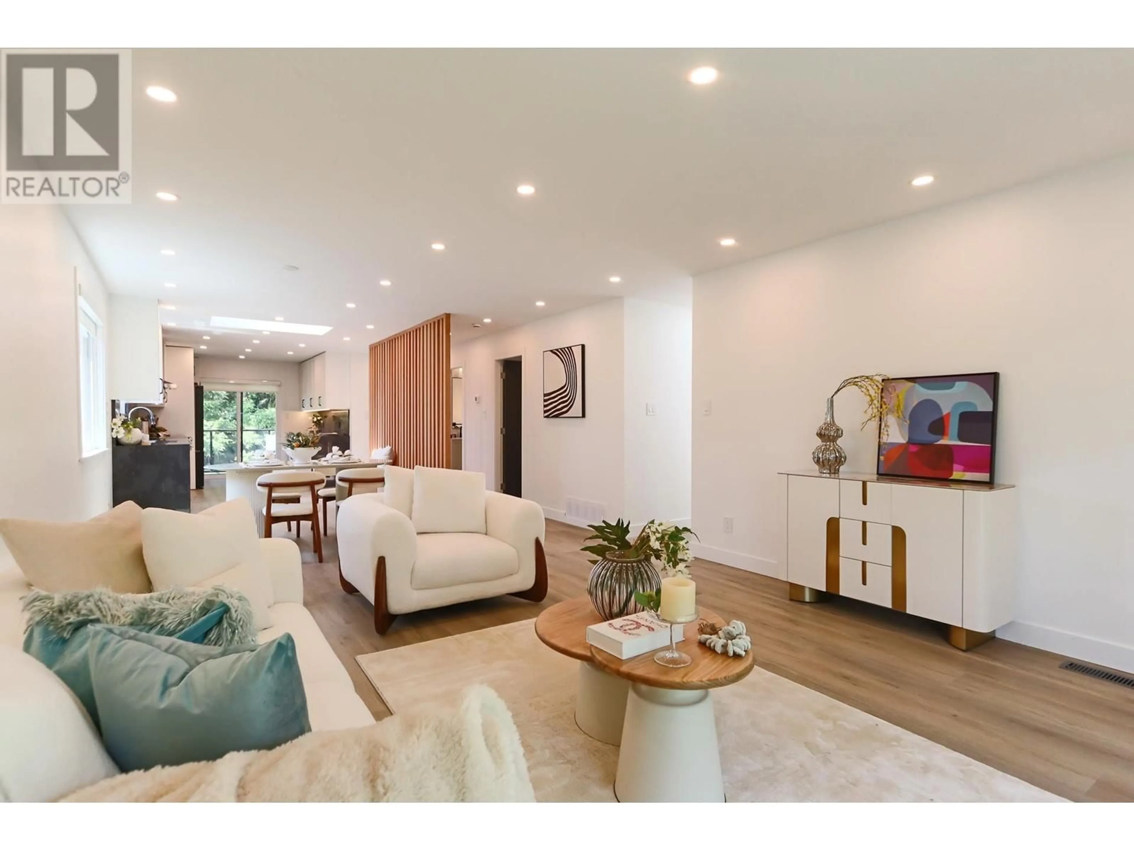 Living room with furniture, wood/laminate floor for 1685 BOWSER AVENUE, North Vancouver British Columbia V7P2Y6