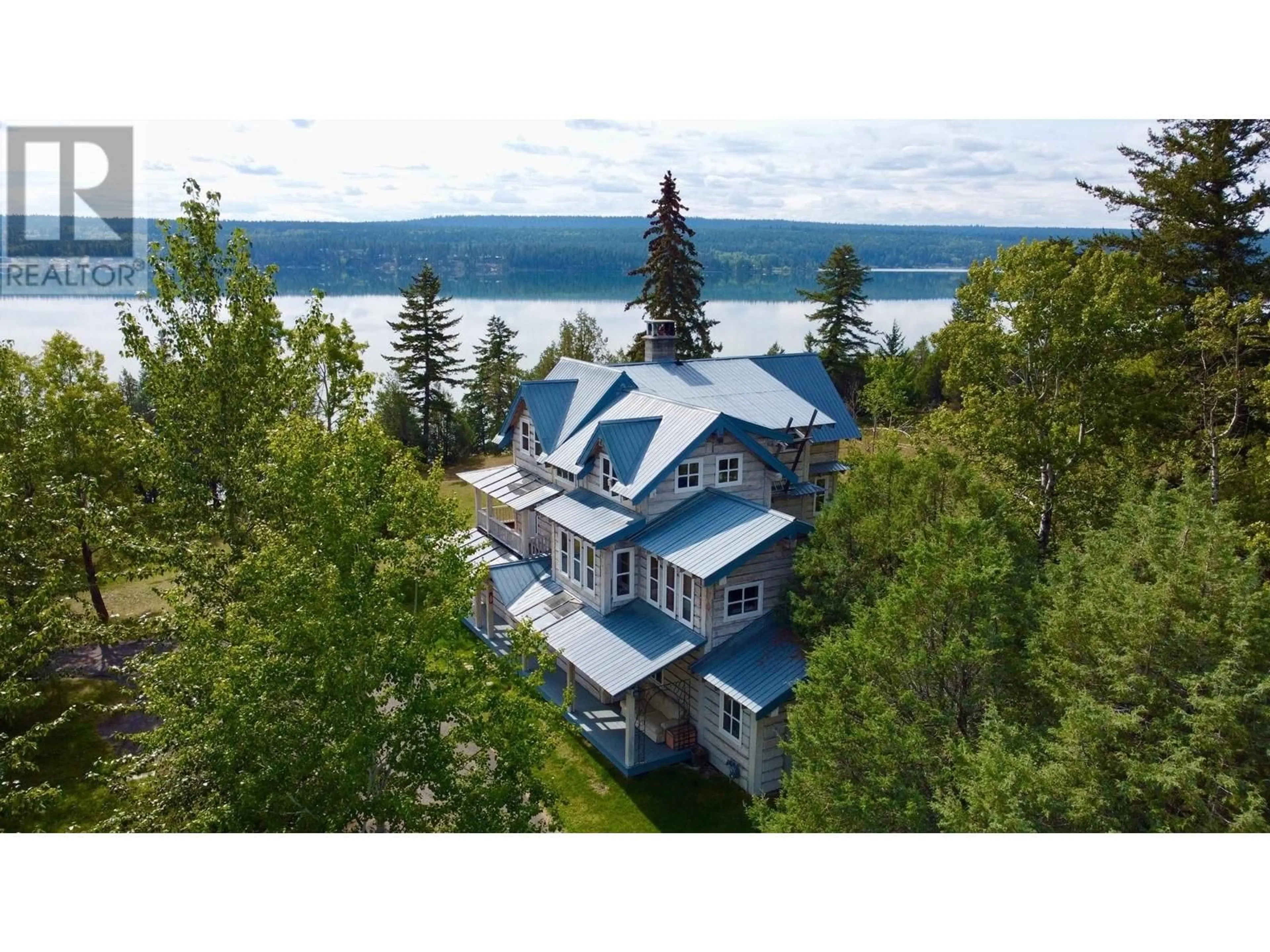 A pic from outside/outdoor area/front of a property/back of a property/a pic from drone, water/lake/river/ocean view for 4802 HAMILTON ROAD, Lac La Hache British Columbia V0K1T0