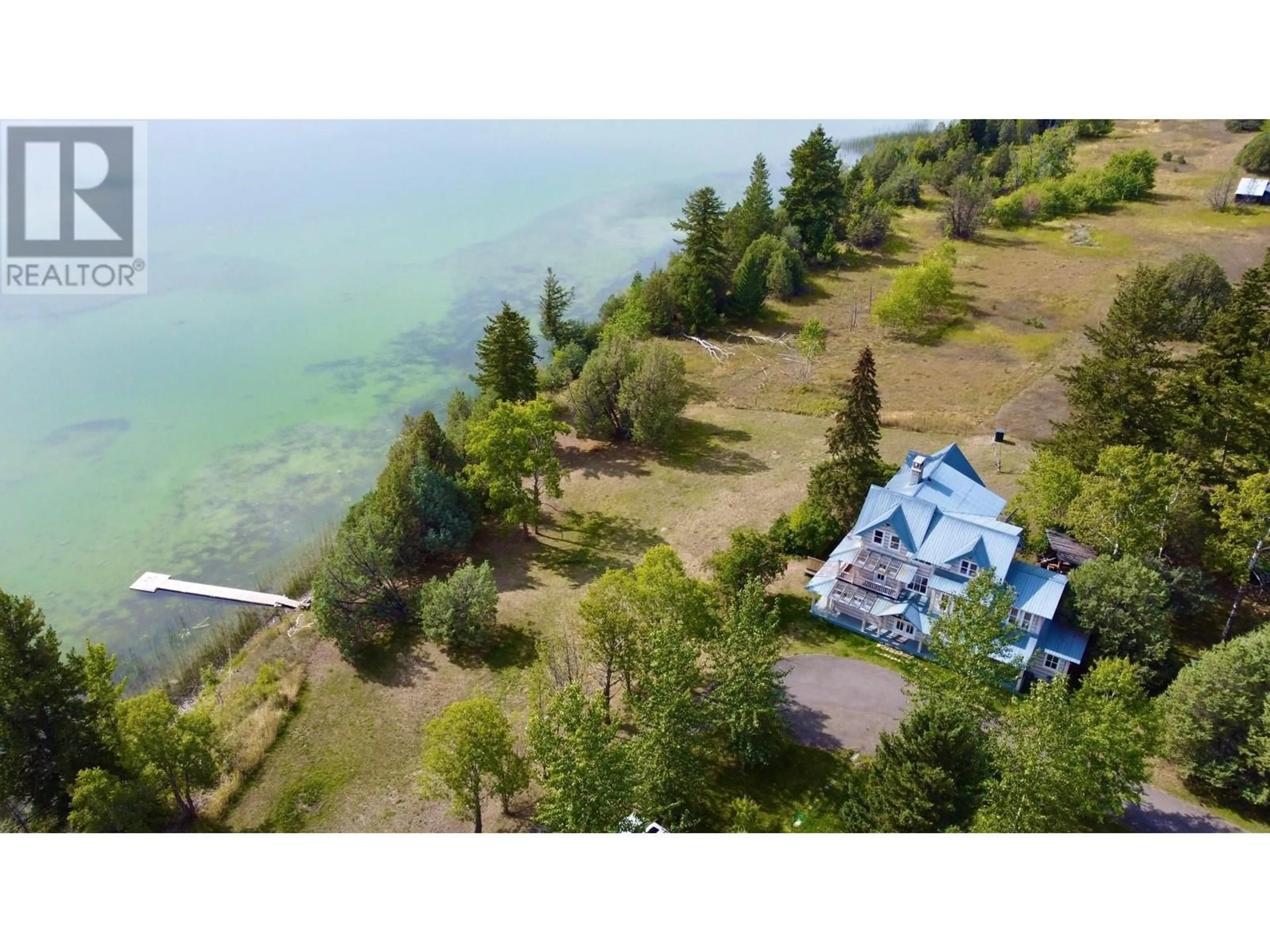 A pic from outside/outdoor area/front of a property/back of a property/a pic from drone, water/lake/river/ocean view for 4802 HAMILTON ROAD, Lac La Hache British Columbia V0K1T0
