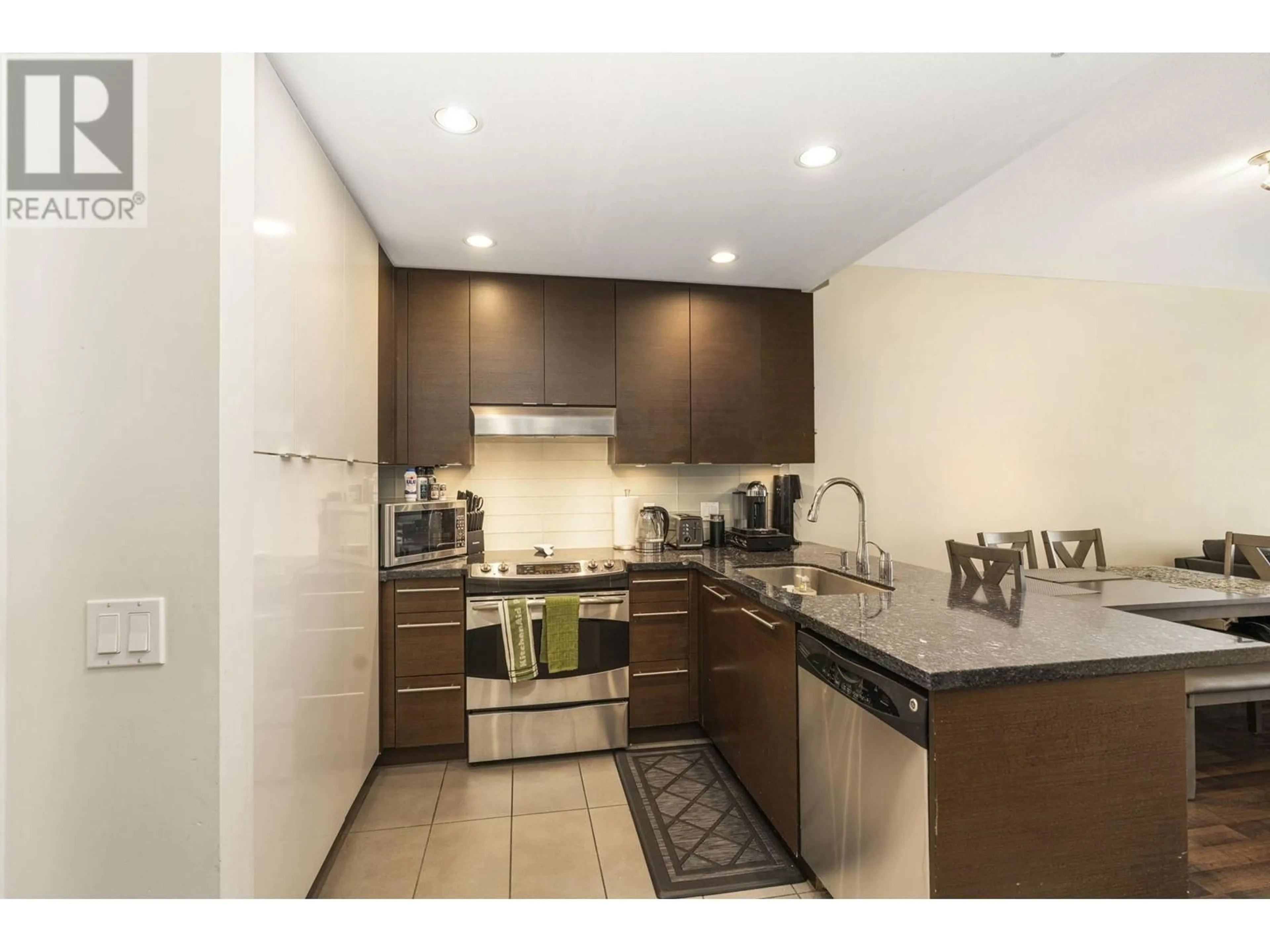 Standard kitchen, ceramic/tile floor for 212 - 3478 WESBROOK MALL, Vancouver British Columbia V6S0B6