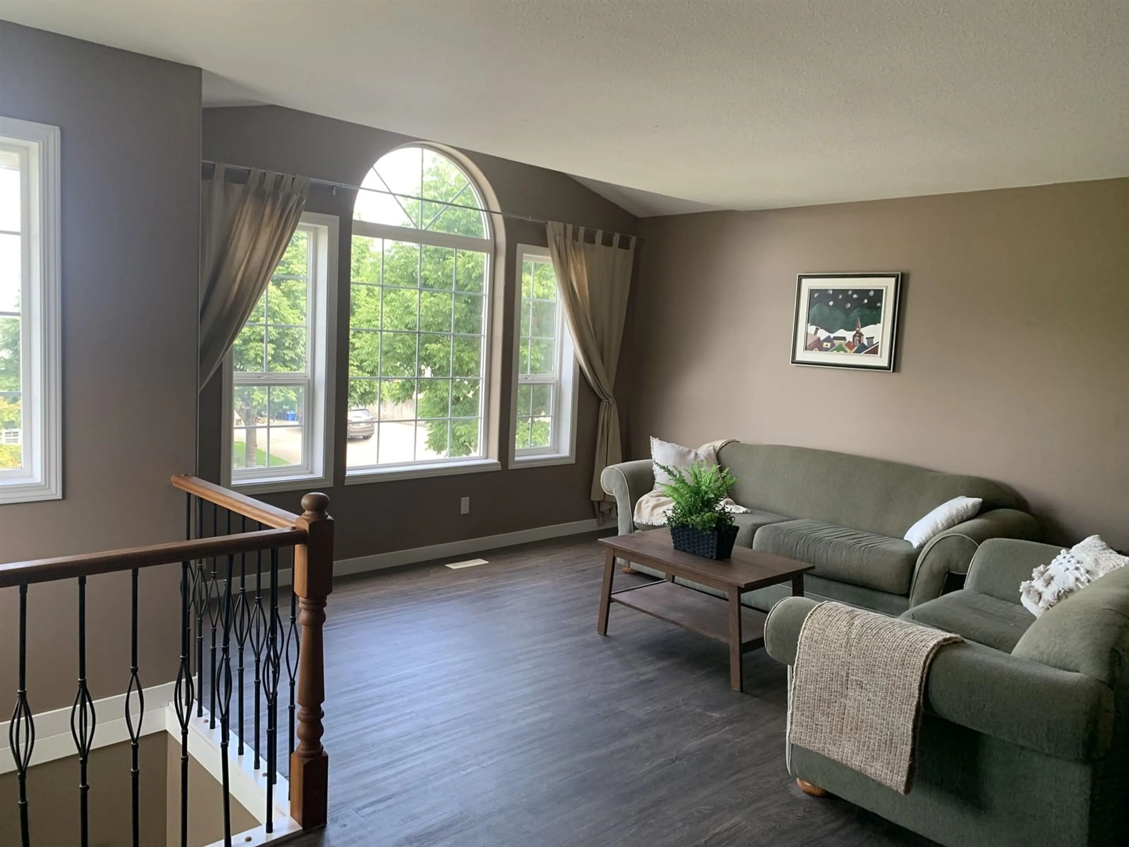 Living room with furniture, wood/laminate floor for 46690 SYLVAN DRIVE, Chilliwack British Columbia V2R3W5