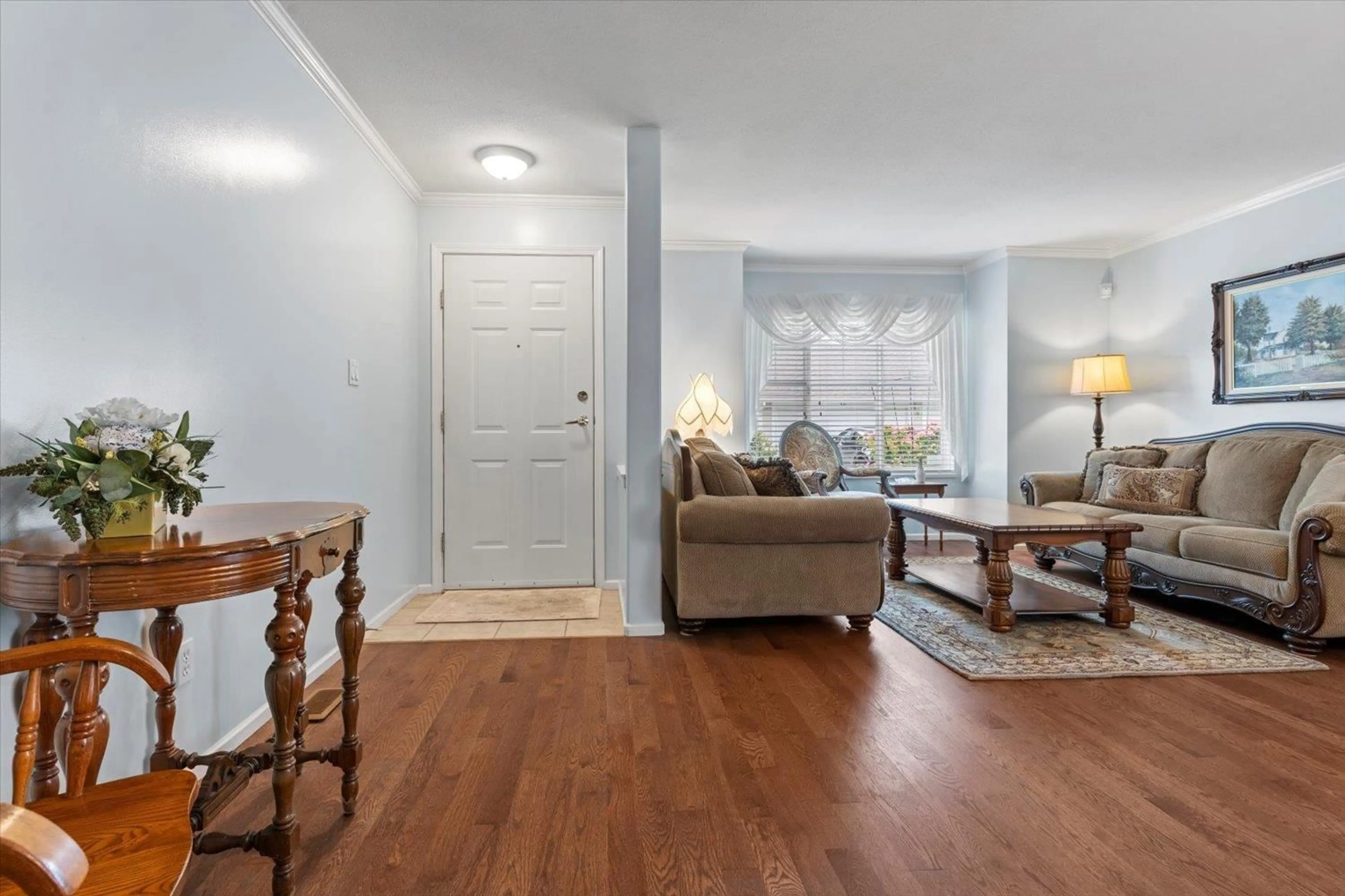 Living room with furniture, wood/laminate floor for 43 - 6885 184, Surrey British Columbia V3S9G1