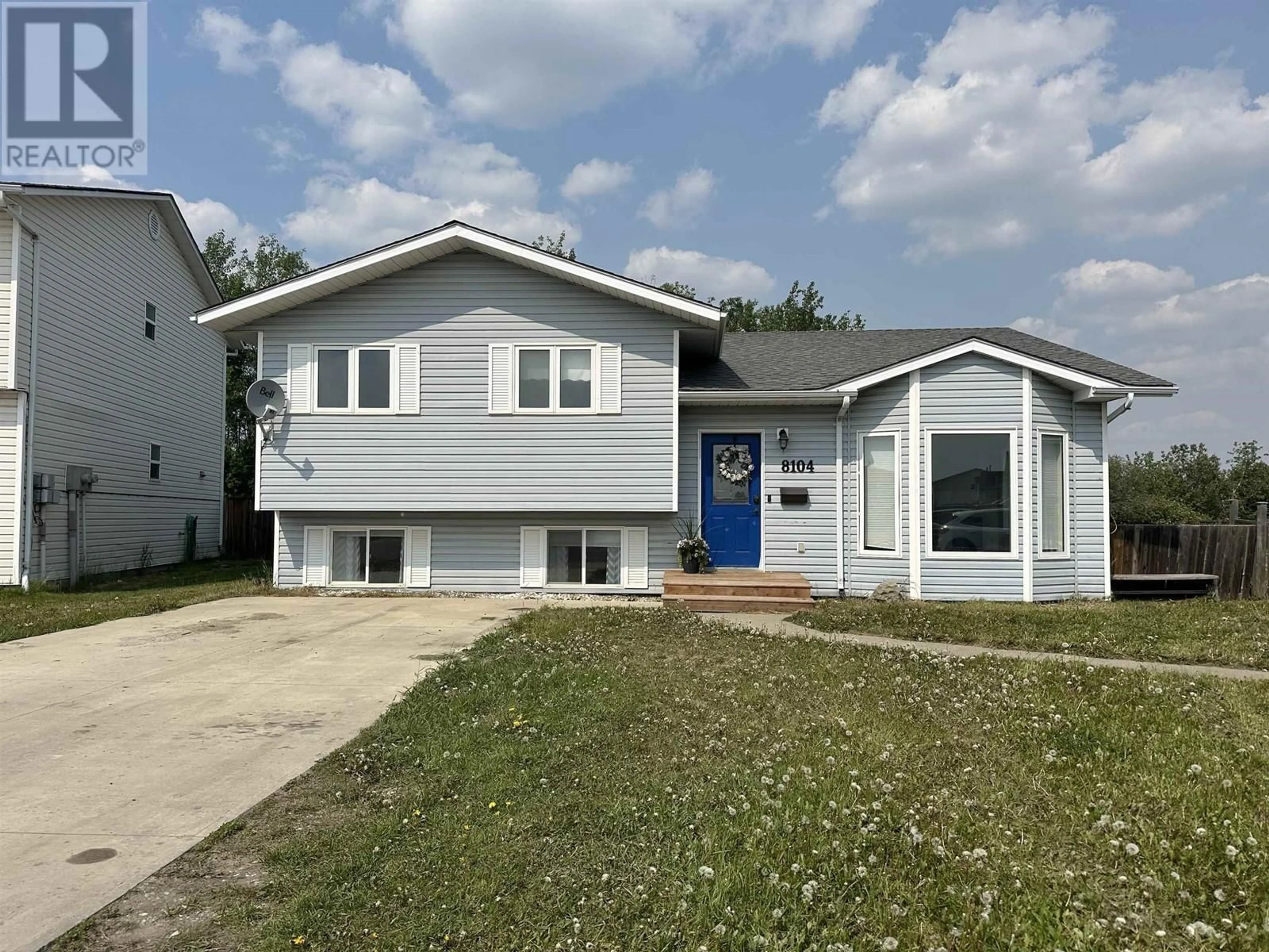 Home with vinyl exterior material, street for 8104 90 AVENUE, Fort St. John British Columbia V1J6P8