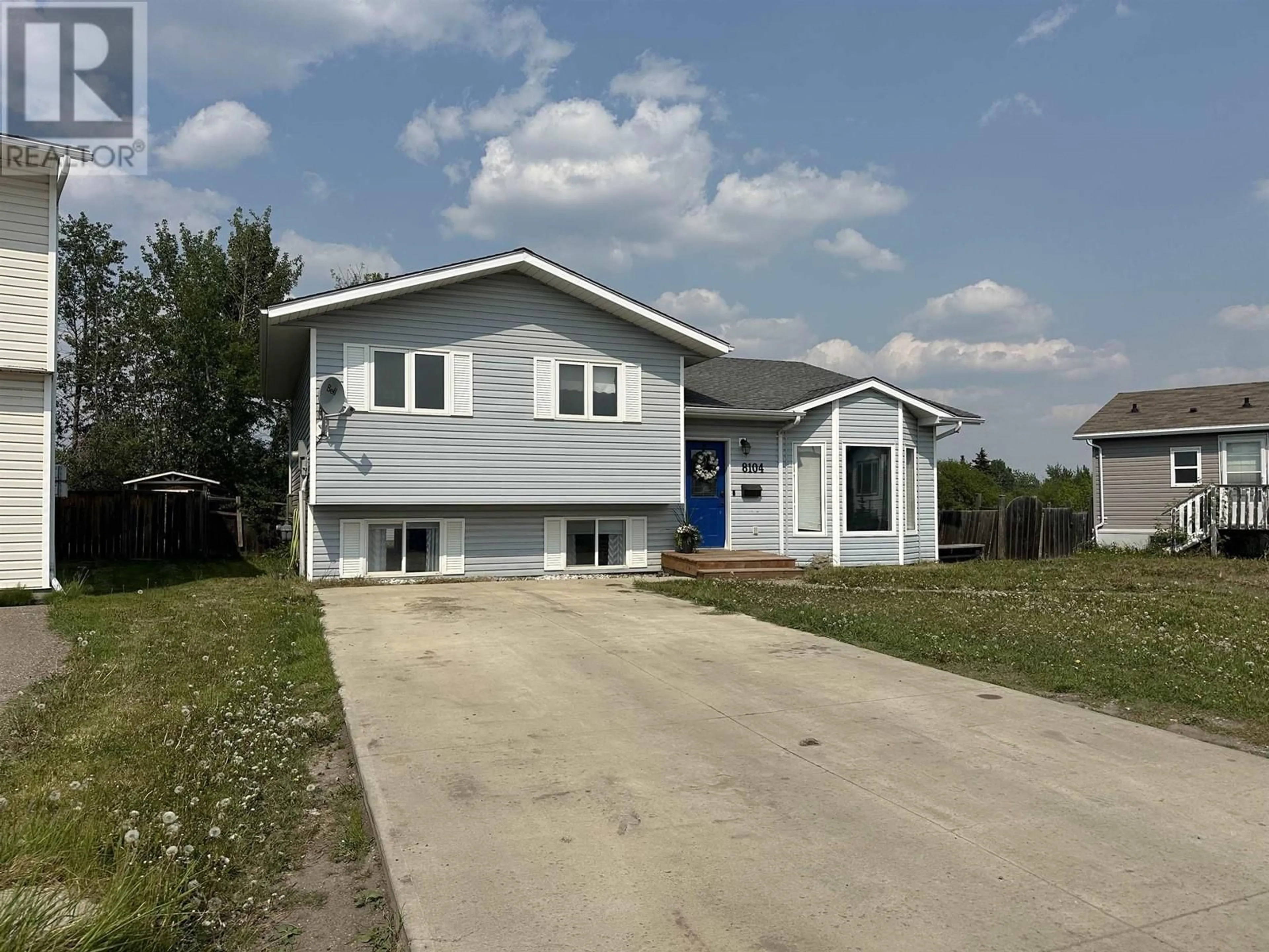 Home with vinyl exterior material, street for 8104 90 AVENUE, Fort St. John British Columbia V1J6P8