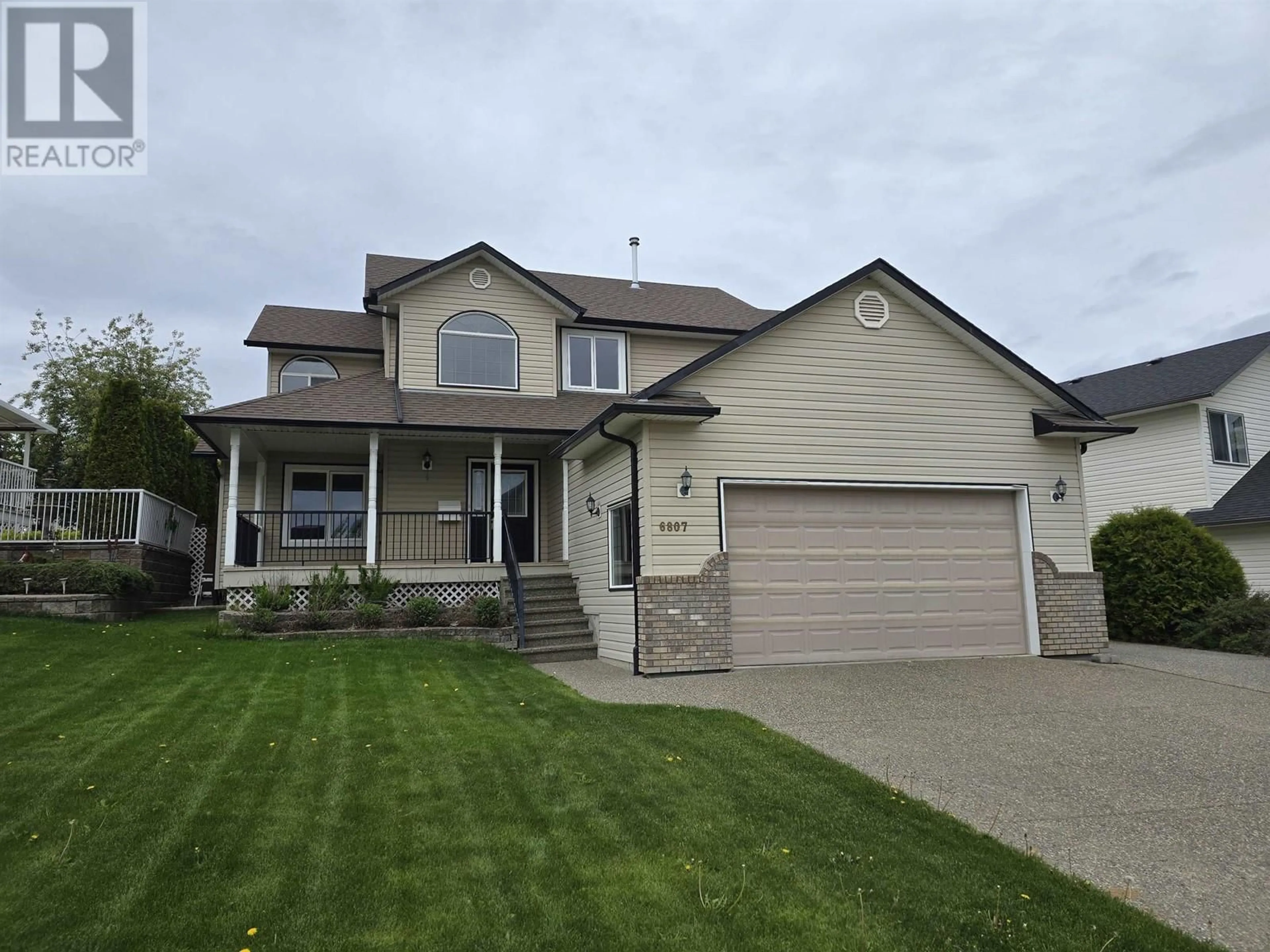 Home with vinyl exterior material, street for 6807 WESTMOUNT DRIVE, Prince George British Columbia V2N6R5