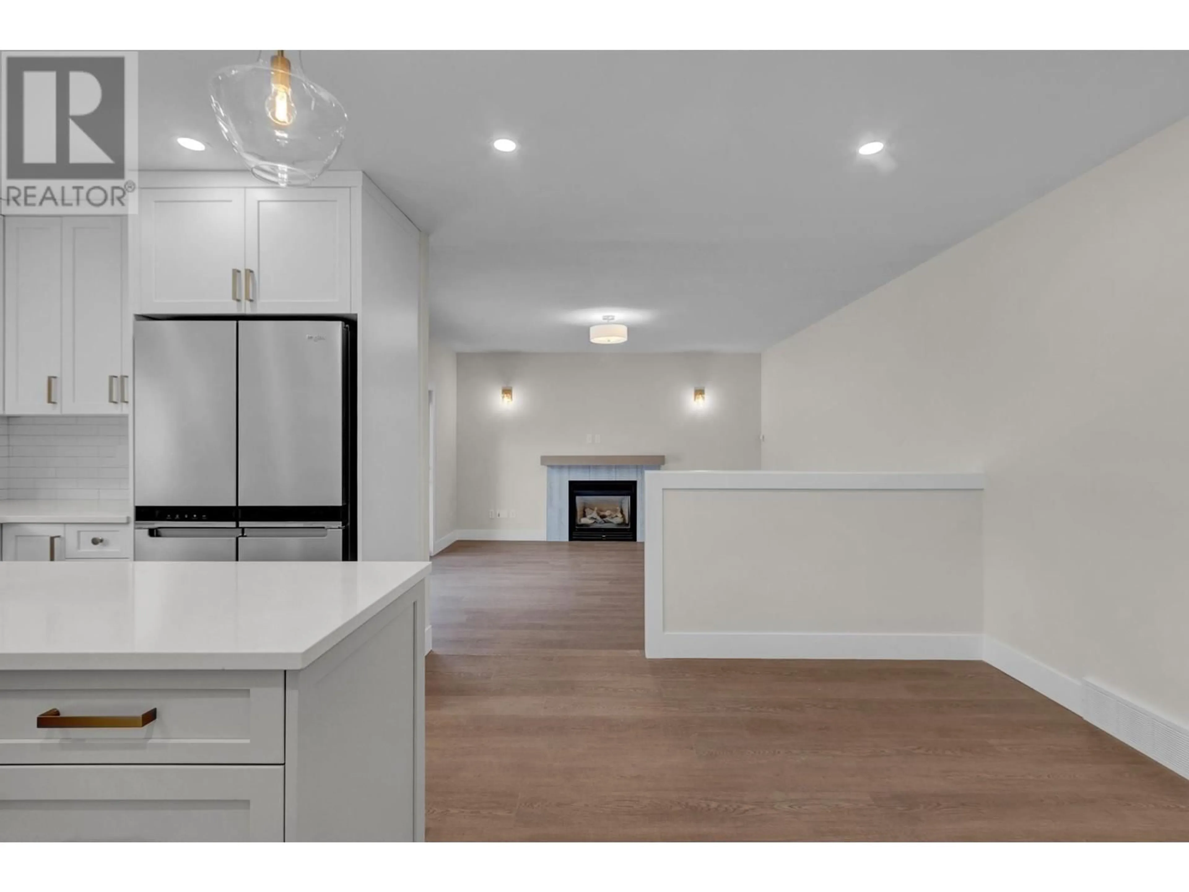 Open concept kitchen, wood/laminate floor for 6807 WESTMOUNT DRIVE, Prince George British Columbia V2N6R5