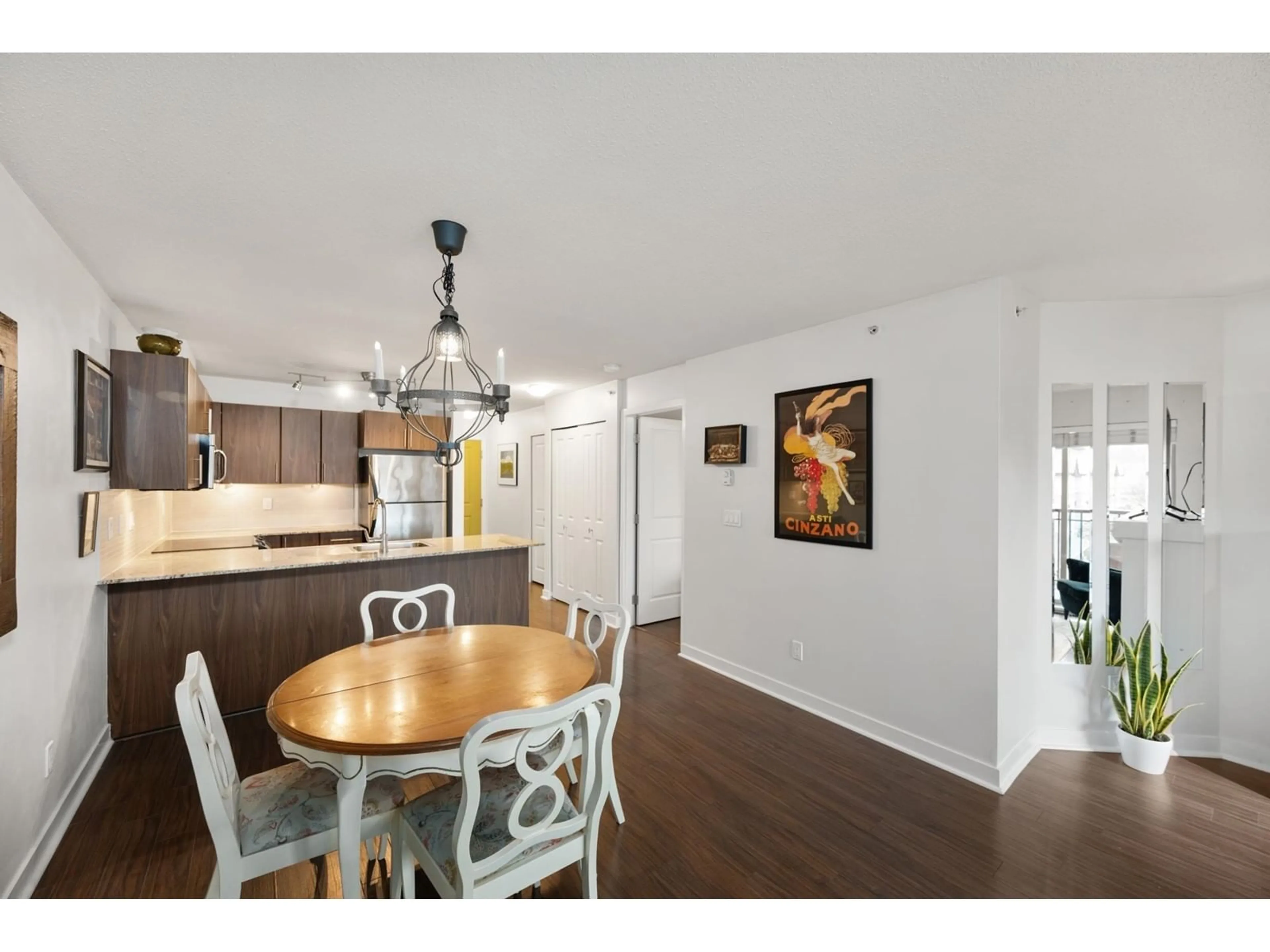 Open concept kitchen, wood/laminate floor for A412 - 8929 202, Langley British Columbia V1M0B4