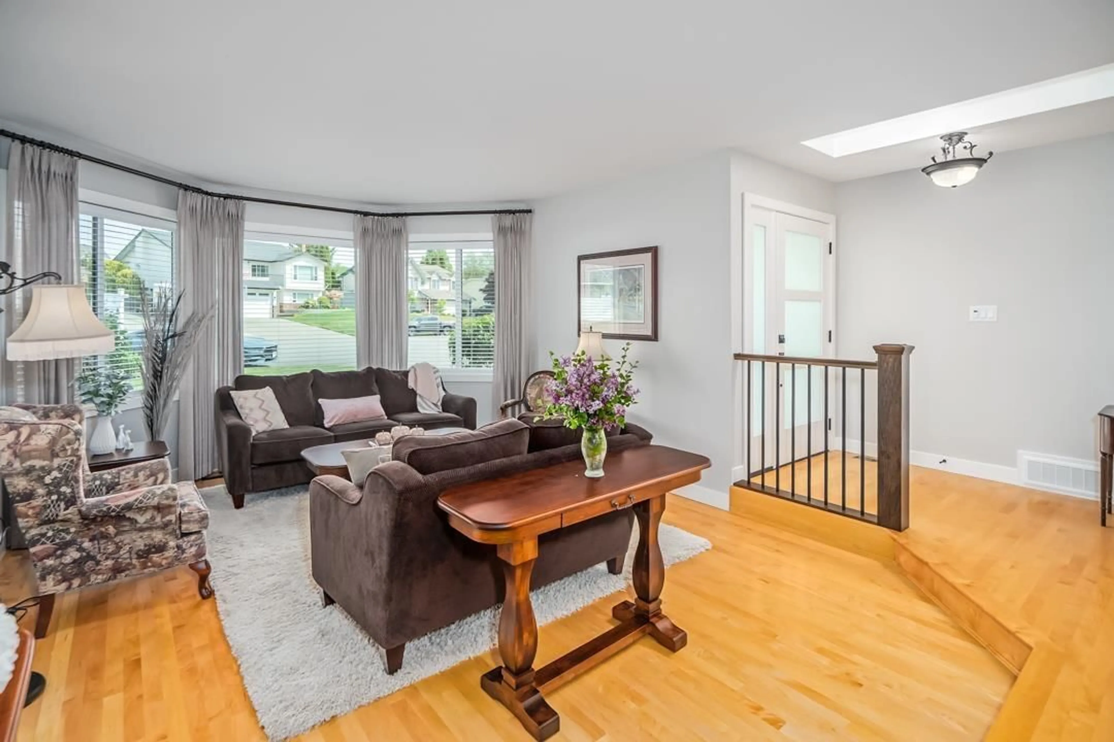 Living room with furniture, wood/laminate floor for 34936 GLENALMOND, Abbotsford British Columbia V2S7G6