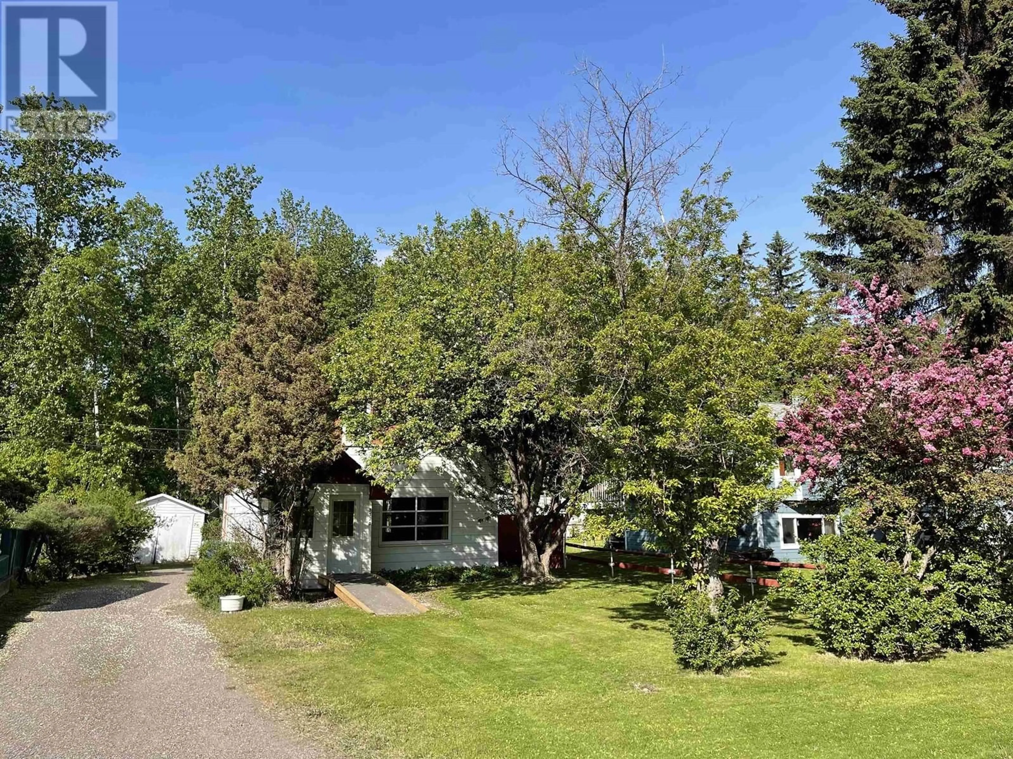 A pic from outside/outdoor area/front of a property/back of a property/a pic from drone, street for 3523 2ND AVENUE, Smithers British Columbia V0J2N0