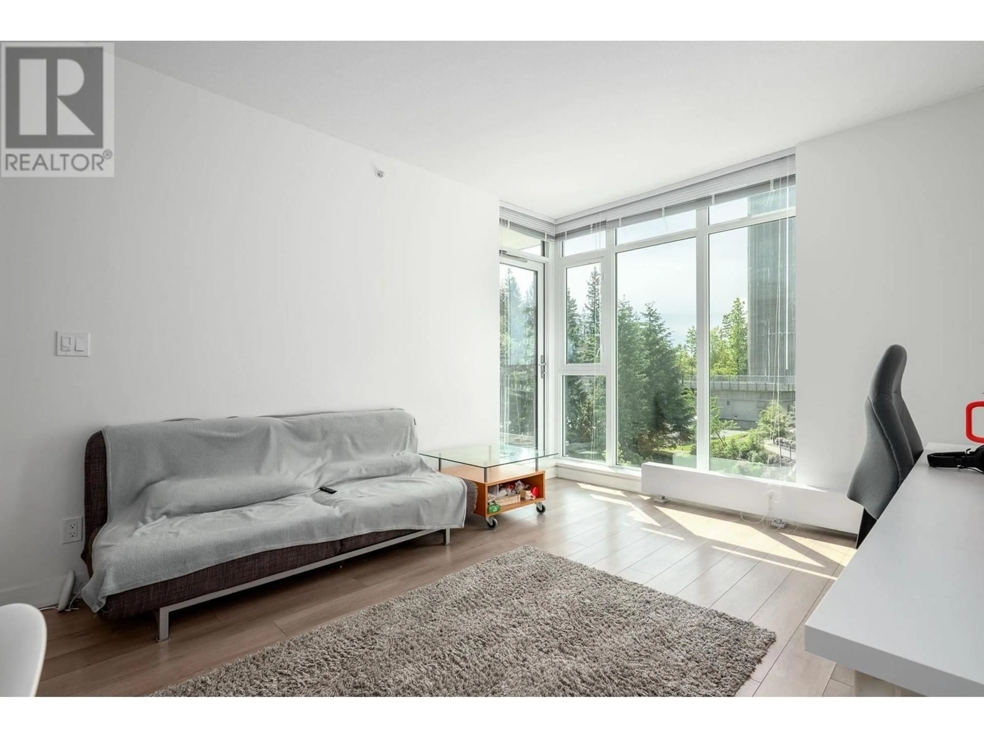 Living room with furniture, unknown for 503 - 8940 UNIVERSITY CRESCENT, Burnaby British Columbia V5A4Y8