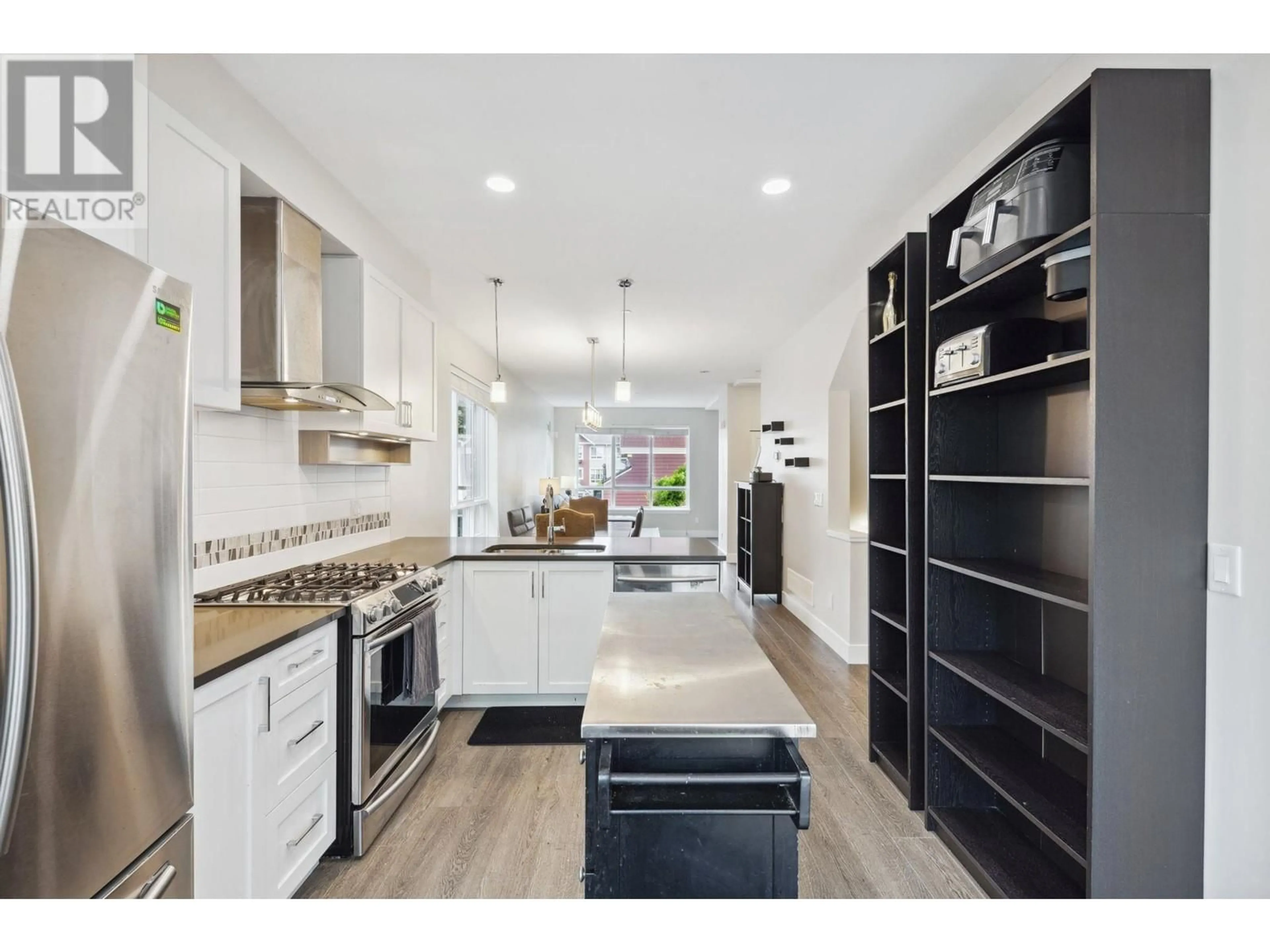 Open concept kitchen, ceramic/tile floor for 511 - 4688 HAWK LANE, Delta British Columbia V4M0B7