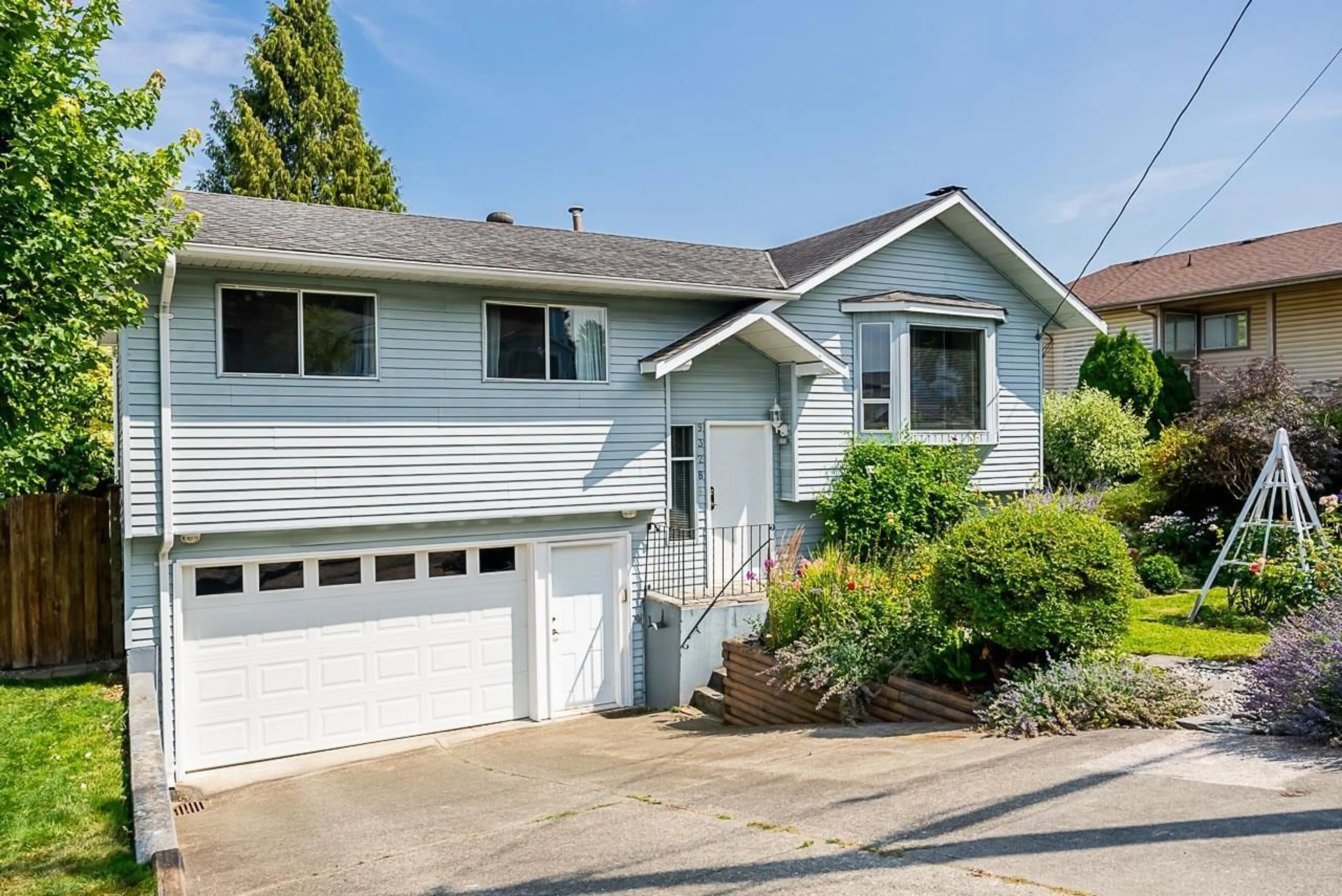 Home with vinyl exterior material, street for 9328 213, Langley British Columbia V1M1P6